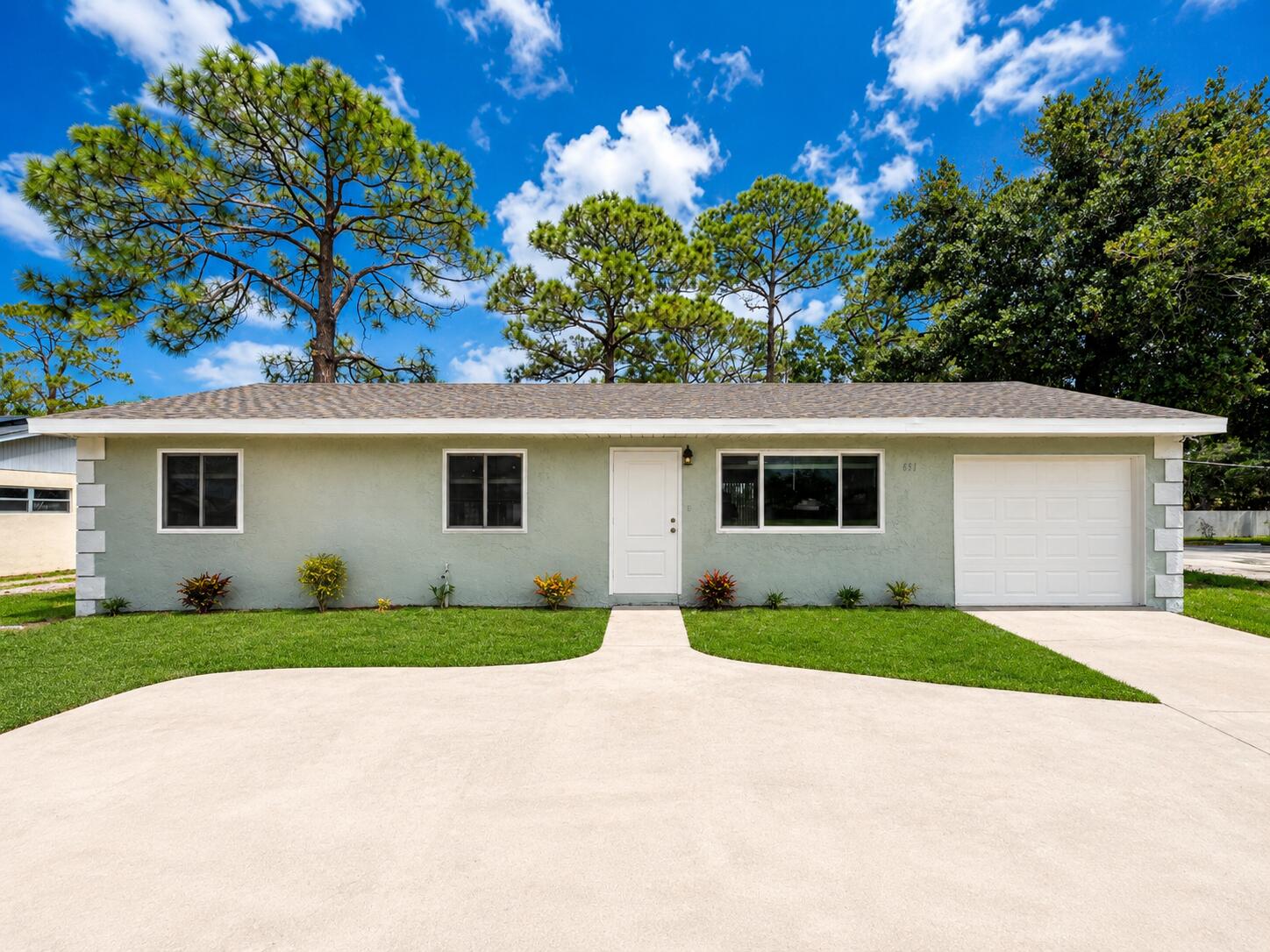 Completely redone and ready to impress! This 3BR/2BA home has been fully renovated with a brand new roof, A/C, modern kitchen, stylish bathrooms, new appliances, and impact windows throughout. It sits on a spacious lot with tons of room to build your dream pool or outdoor space. Located in a super convenient area close to shops, dining, and just a quick drive to the beach. Everything feels fresh, clean, and move-in ready...NO HOA, City Water/Sewer! Perfect for homeowners or investors alike. Homes like this go fast, so don't wait!
