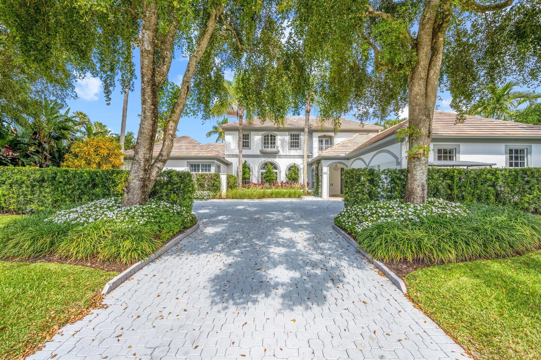 Welcome to Golf Brook Drive, an exclusive address within the renowned Palm Beach Polo. This extraordinary estate offers 5 spacious bedrooms and 6 full bathrooms plus 2 half baths, delivering refined luxury and exceptional comfort for both family living and entertaining.
Step through the grand entry into an impressive formal living room, where a stately fireplace and expansive windows frame picturesque views of the manicured grounds and the serene Dunes Preserve. Natural light fills the space, creating a warm yet sophisticated ambiance.
The elegant dining room is a true showpiece, highlighted by a dramatic barreled vault ceiling that elevates every gathering into a memorable occasion. Designed for both intimate dinners and grand celebrations, this space seamlessly blends architectural beauty with functionality.

The expansive primary suite serves as a private retreat, complete with a comfortable sitting area, an oversized walk-in closet, and a spa-inspired en-suite bath featuring a soaking tub, separate glass-enclosed shower, and refined finishes throughout.

Each additional bedroom is generously proportioned and thoughtfully designed with its own en-suite bath, ensuring privacy and comfort for family members and guests alike.

This remarkable residence combines timeless elegance, thoughtful design, and an unparalleled location--offering the very best of luxury living in one of Wellington's most prestigious communities.