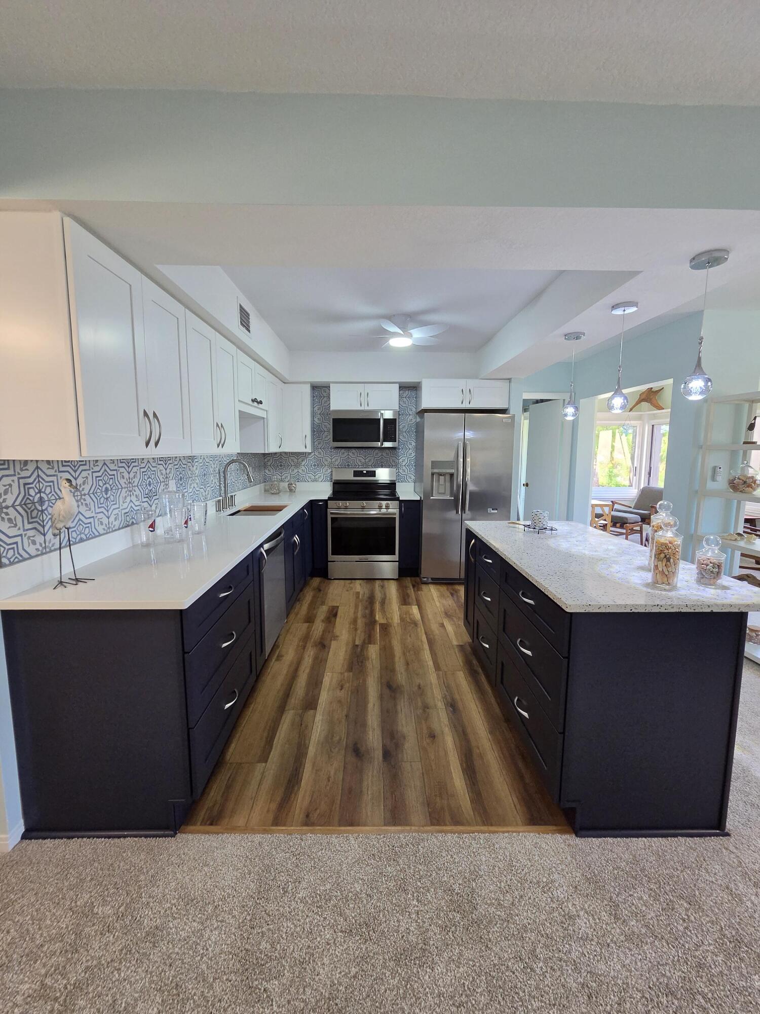 Move-In Ready * Fully Renovated * Stunning Sunset Views * Pet-Friendly Community Experience the best of Florida's Treasure Coast lifestyle in this beautifully renovated 2-bedroom, 2-bath, third-floor condominium located in the highly desirable Conquistador community. Every detail has been thoughtfully updated, making this home truly move-in ready. From the brand-new HVAC system and luxury flooring to the modern kitchen, beautifully remodeled bathrooms, fresh paint, updated lighting, ceiling fans, and stylish furnishings, virtually everything has been replaced so you can simply unpack and start enjoying your new home. Take in peaceful views of the golf course pond, dog park, and spectacular Florida sunsets from your private retreat. The building has recently undergone si gnificant improvements, including a new roof, new siding, fresh exterior paint, updated lighting, and a community pool renovation featuring a resurfaced pool and new fencing. Inside, residents are welcomed by a beautiful atrium with elevator access, mailboxes, and a gathering space that hosts seasonal social events. A private storage unit is included, and the conveniently located third-floor laundry room is just steps away. Life at Conquistador is about more than just your home, it's about enjoying an active, resort-style lifestyle. Residents have access to an impressive clubhouse featuring a fitness center, library, ballroom, card rooms, multiple gathering spaces, tennis courts, swimming pool, and bathhouse. One of the community's most treasured amenities is its private 3-acre waterfront park on the scenic St. Lucie River. Enjoy a private dock, sandy beach, kayak launch, fish cleaning station, and peaceful seating areas where you can watch breathtaking sunrises and sunsets, exciting rocket launches, dolphins playing in the river, or spend the afternoon fishing. Conveniently located just minutes from downtown Stuart, beautiful beaches, shopping, dining, golf courses, and medical facilities, this exceptional home provides the perfect combination of comfort, convenience, and the relaxed Florida lifestyle you've been dreaming of. Whether you're searching for a year-round residence or a seasonal escape, this turnkey home is ready for you. Come by and discover why so many love calling Conquistador home!