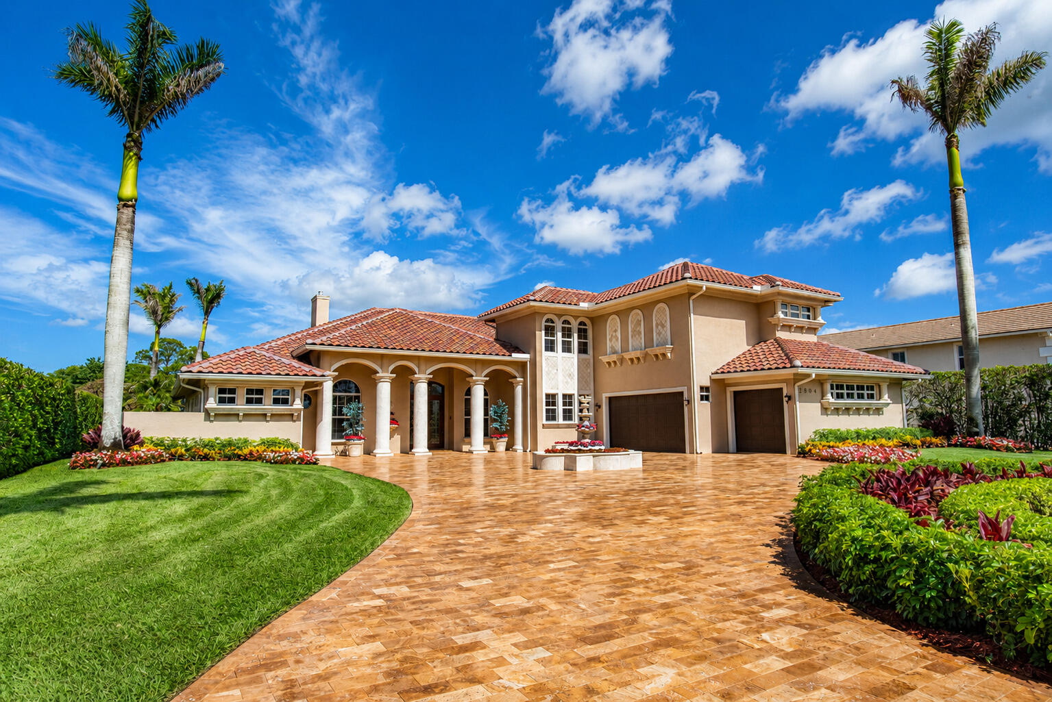 Exceptional 5,155 SF estate in Meadowood Golf & Country Club, positioned on the 8th tee box. This 4BR, 6BA residence offers a 3-car garage, two offices, stunning chef's kitchen with custom cabinetry, Wolf/Sub-Zero/Miele appliances, two pantries, family room with pocketing impact sliders, two gas fireplaces, stunning Marble Floors and a private upstairs movie theater with full bath. Incredible outdoor living with travertine driveway, garage flooring & pool deck, resort-style pool oasis, lush $100K+ landscaping, newer barrel tile roof, impact doors, custom molding, and coffered ceilings.