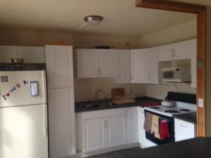 Beautiful Renovated Townhouse in desirable location. Well maintained private fenced patio, bamboo wood flooring downstairs, wood laminate upstairs, tile in the bathrooms, updated cabinets in kitchen. Do not miss this one!