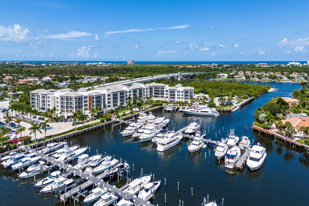 This PERFECT 3 bedroom, 3.5 bath + den Azure condo overlooking the stunning Marina is elegantly furnished including artwork, accessories, kitchenware and linens. Extraordinary attention to details include porcelain flooring, built-in cabinetry, quartz waterfall countertops, sophisticated lighting fixtures, designer wallpapers, custom electronic window treatments and a gourmet kitchen with Thermador appliances. Natural light flows in from floor to ceiling impact doors and windows that open to a covered summer kitchen and a large terrace offering stunning marina and water views. Azure amenities include individual elevator entry, private garages, 24/7 security, extensive concierge services, resident club rooms, a fitness center and spa, two resort pools and direct ocean access for boaters Located in Palm Beach Gardens close to I-95 and Florida's Turnpike, Azure is just minutes from the airport, commercial office centers, the beach, fine shopping and dining and all the cultural and recreational venues the Palm Beaches offer.