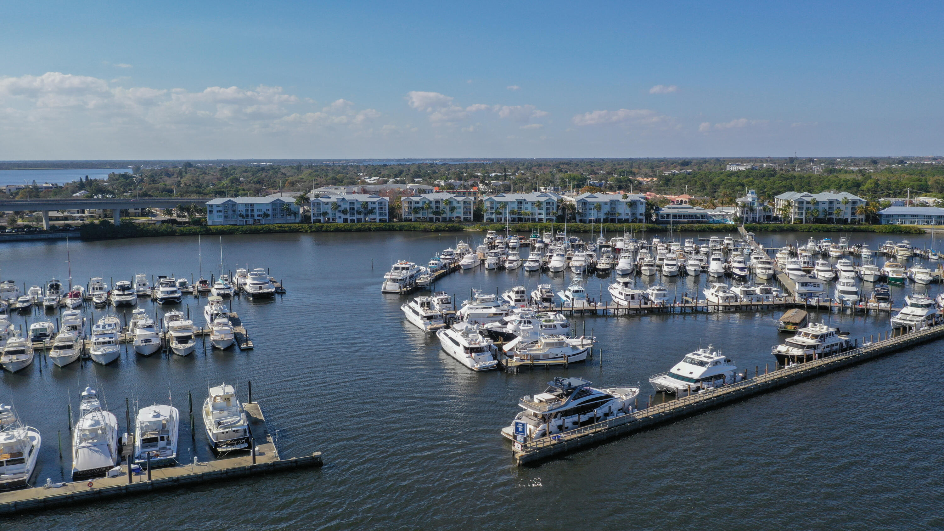 WATERFRONT OPPORTUNITY AWAITS!! MINI CITY LIVING AT ITS FINEST!! THIS FURNISHED HOME AWAITS A NEW OWNER. BRING YOUR IDEAS ! TILED/CARPETED FLOORS, PLENTY OF SUNSHINE IN THIS OVER THE POOL UNIT WITH EXCEPTIONAL WATERVIEW. GRANITE COUNTERTOPS AND UTILTIY ROOM FOR ALL YOUR EXTRA STUFF! TWO UNDER BUILDING SPACES ASSIGNED TO YOU! GREAT AMENITIES FOR YOUR ENJOYMENT, PLANNED SOCIAL ACTIVITIES, CLUBHOUSE W/FITNESS CENTER, SAUNA, STEAM ROOM, POOL CAFE, COMMUNITY POOLS, HOT TUB & BILLIARDS ROOM. PREMIUM VIEW FOR 4TH OF JULY FIREWORKS! TIDEHOUSE RESTAURANT ON PREMISE! CLOSE PROMIXITY TO DOWNTOWN STUART! FULL-SERVICE MARINA WITH DOCKAGE UPON AVAILIBILITY. COMING SOON 2027 ATLANTIC POINT MARINA AT THE SOUTH END OF THE COMMUNITY! SEE IT TODAY!!