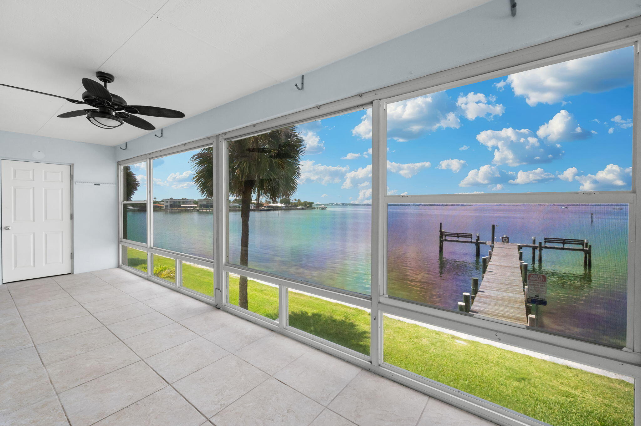 Best view out there, rare lengthwise views of the Intracoastal which allows you spectacular sunrises and sunsets. Enjoy an ever-changing panorama of sparkling water, sailboats, dolphins, snook, sea turtles, redfish, and countless other nautical treasures. So close to the Indian River Lagoon, the most diverse estuary in North America, you can see lobsters crawling beneath the dock from inside your home. Very solid CBS construction, new roof, impact windows, upgraded kitchen, 2022 A/C, newer water heater, upgraded bathrooms, tiled showers, tile in entire unit and abundant storage. Boat lovers dream with private marina and boat parking permitted. Ideally located directly across from the completely renovated pool and newly updated clubhouse with     a library, billiards, exercise equipment, screened porch, barbeque area, bocce, tennis, pickleball, shuffleboard, classes and more. Restaurants, beaches, world class fishing, aquarium, historic theater, waterfront market, live music, and free car shuttle to Downtown. Live like you are on vacation all year long, leave the mainland behind, you are on Island time now.