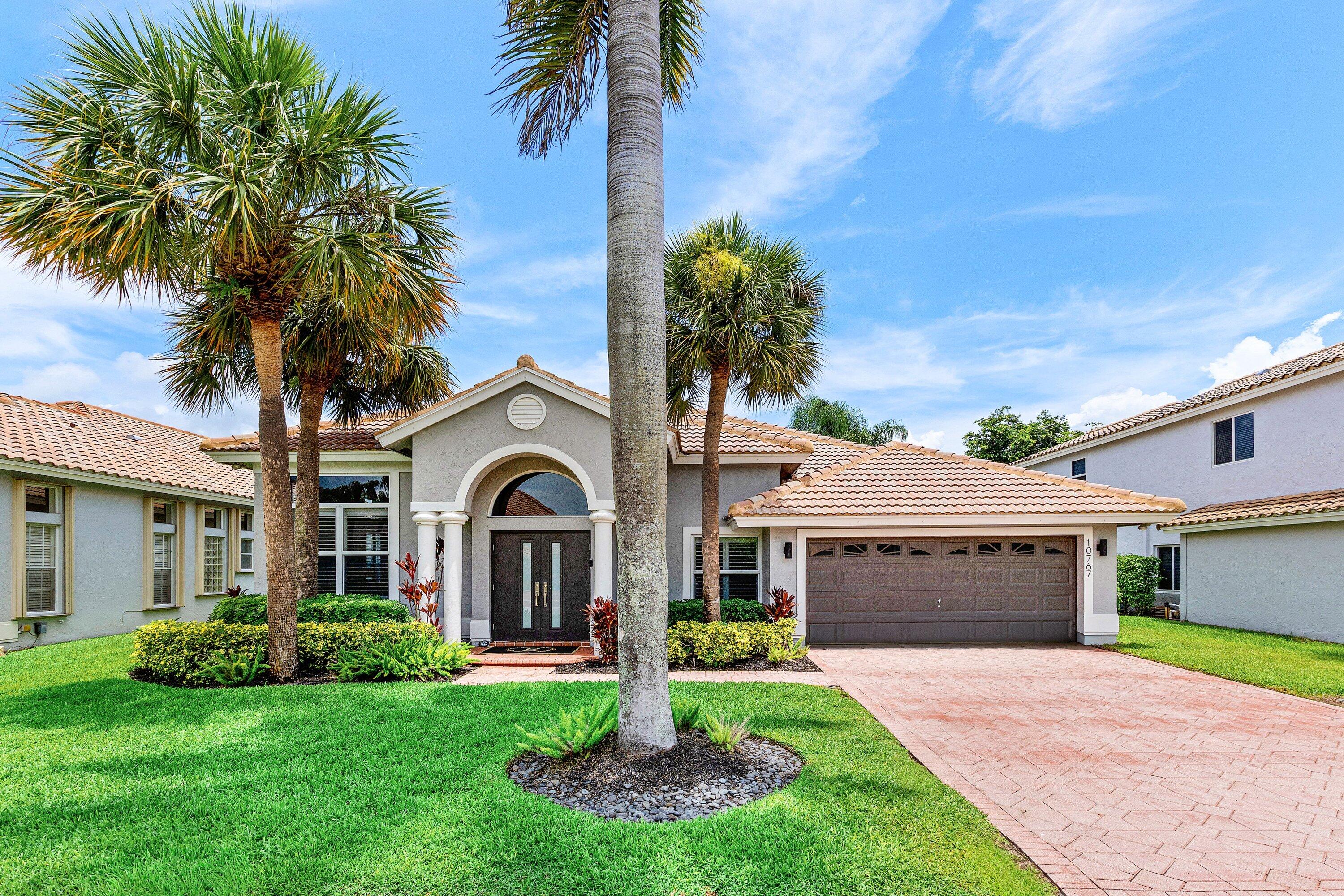 Beautifully renovated lakefront home in the desirable, friendly Boca Isles community. This light-filled residence features soaring ceilings, an open floor plan, bamboo wood flooring, recessed lighting, impact windows, & a flexible front room ideal for an office, den, or playroom. The updated kitchen opens to the family room & offers granite countertops and stainless steel appliances. All bathrooms have been remodeled, including the primary suite with a Jacuzzi tub & dual walk-in closets. Major updates include a 2017 roof and 2019 A/C. Spacious backyard with room for a pool. Low HOA includes cable, high-speed internet, clubhouse, gym, pool, tennis, new pickleball courts, playground, and social room. Gated community near A-rated schools, shopping, dining, & South County Regional Park