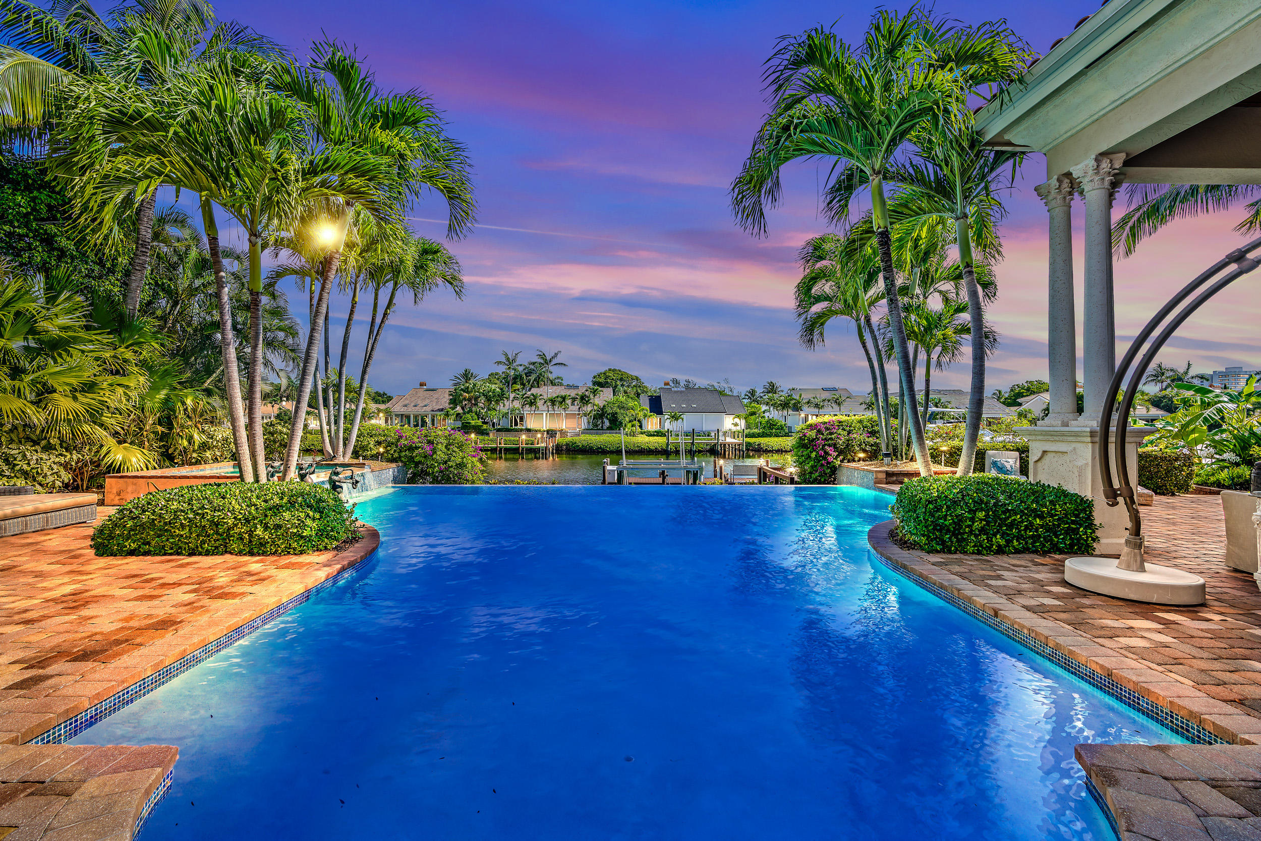 This special home is located on the sought after street of Spyglass Lane in the prestigious  Admirals Cove. where you have golf in the front of your home and waterways leading out the Intracoastal in the back.   Custom built by Mustapick Builders, the home features a large master suite with a sitting area, breakfast bar, his and her closets and baths, a custom gourmet kitchen open to the family room, formal dining room, media room, 3 guest bedrooms and so much more!