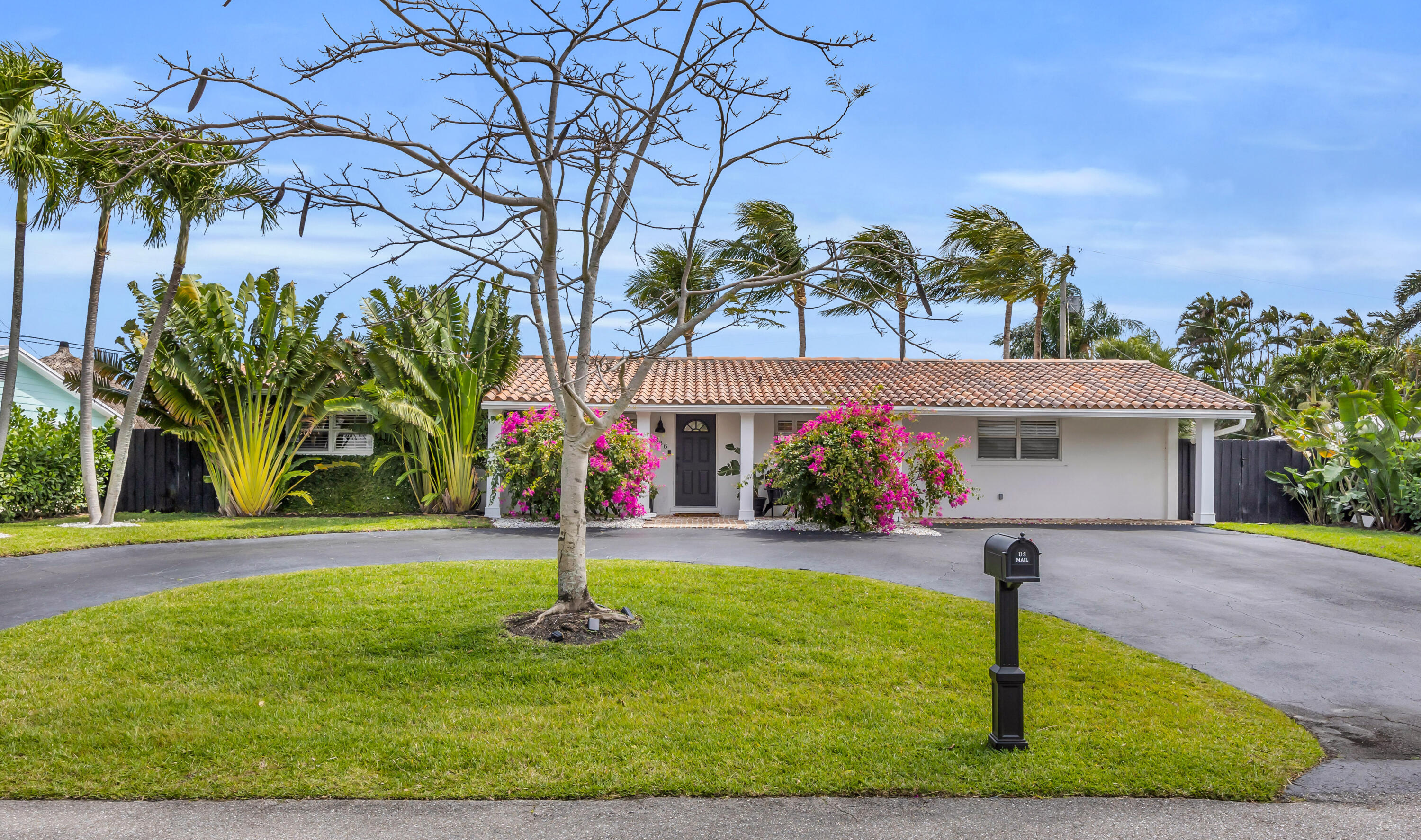 Completely remodeled and move-in ready, 366 Elm Avenue is the Tequesta home you've been waiting for. Step inside to a bright, open-concept floor plan featuring a beautifully designed living space and a designer kitchen that overlooks your private tropical backyard.  This exceptional home offers 4 spacious bedrooms and 3 full bathrooms, blending modern finishes with comfortable everyday living. Outside, the covered patio is perfect for entertaining or relaxing while overlooking the sparkling pool and lush, turfed backyard—your own private oasis.  Ideally located in the heart of Tequesta, you'll enjoy walking or biking to local coffee shops, restaurants, boutiques, parks, and more, all while coming home to the tranquility of a quiet street and peaceful setting. This is South Florida living  at its finest