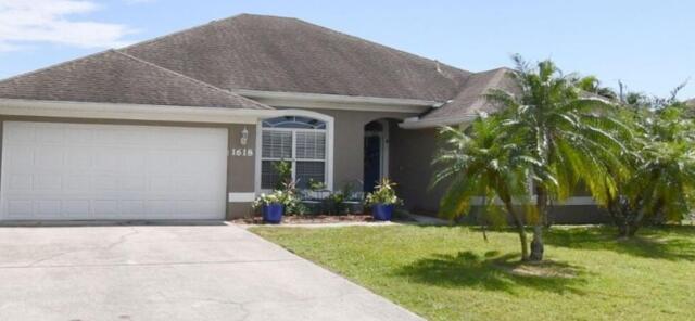 Over 3000 SQ FT home on a 1/4 acre fenced lot with an additional 1/4 acre lot that can be built on or divided and sold. Listing is for both home and lot together. Entire house runs on solar, Basically no electric bill. There is a 100 gallon propane tank for grilling or for a portable generator with a transfer switch in place. Concrete patio off back of house, Large shed and Gazebo for outdoor entertaining. In side bright airy open concept living, Dining, Great room, Breakfast room opens to large kitchen. Tile flooring throughout. Large and many closets and cabinets. Built in entertainment center with desk and Wine cabinet. Walk in  pantry. No HOA and close to shopping and schools. Gatlin to Rosser and left onto Nervia