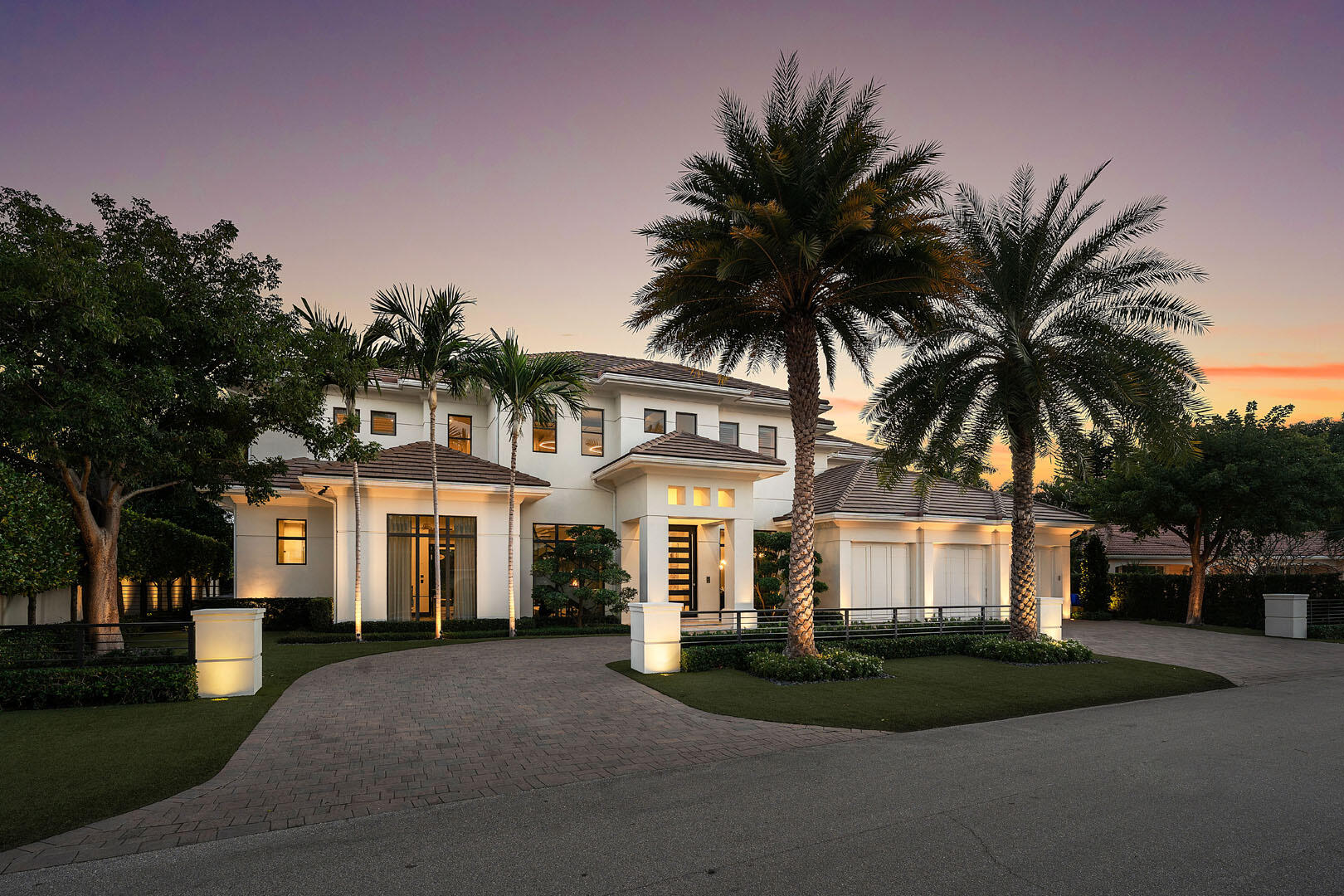 Welcome to 252 S. Silver Palm Road—an exceptional estate built by SRD Building Corp and offering just over 7,000 sq ft of refined living on an oversized interior lot in the prestigious Royal Palm Yacht & Country Club. Designed with outstanding attention to detail, the home features grand living and dining spaces, a first-floor master suite with His & Hers bathrooms and closets, and abundant natural light enhanced by southern exposure. The gourmet kitchen opens seamlessly to the family room, breakfast area, and outdoor spaces, creating effortless flow for everyday living or entertaining. The home is equipped with an intelligent Crestron system for remote control of lighting, security cameras, and more. Upstairs, a spacious living area anchors the secondary bedroom suites and provides a private retreat for guests. Outside, a resort-style pool, al fresco dining, and a bar equipped with a built-in grill provide the perfect setting for year-round enjoyment. This exceptional residence offers an impressive combination of scale, craftsmanship, and luxury in Boca Raton's most prestigious community.