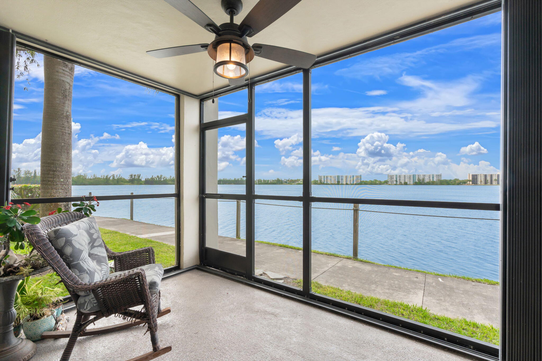 1st floor corner unit. Spectacular views. PET FRIENDLY (25 pounds and under) Impact windows. Beautifully renovated kitchen and bathrooms. New AC. High end porcelain floors & luxiury zebra shades throughout. Tankless hot water heater. Secure gated community. Split floor plan. Large walk-in closet, Freshly renovated building. Superb resort amenities; 3 heated pools, 3 Jacuzzis, 2 saunas, lighted tennis courts, GREAT gym & clubhouse, boating, barbecues & art room, Library, billiards, ping pong, ballroom & bingo! HOA includes complimentary Internet - Comcast's highest speed & OnDemand CABLE (for two TV's) & water. All you pay for is electric  Close to downtown, the beach, Wilton Drive, I/95, the Turnpike & 15 minutes to the airport Lake Emerald requires a 680 or higher credit score.  Deeded parking is just steps from your front door. Pet and owner occupied. 24 hours notice required for showings with possible exceptions. Please call Listing Agent to schedule a showing. There aren't any minimum down payment requirements. Spectacular lake views. Lakeside walking/jogging/biking path. All boating activities are permitted that don't involve gasoline. Lake Emerald is a Wonderful place to come home to.