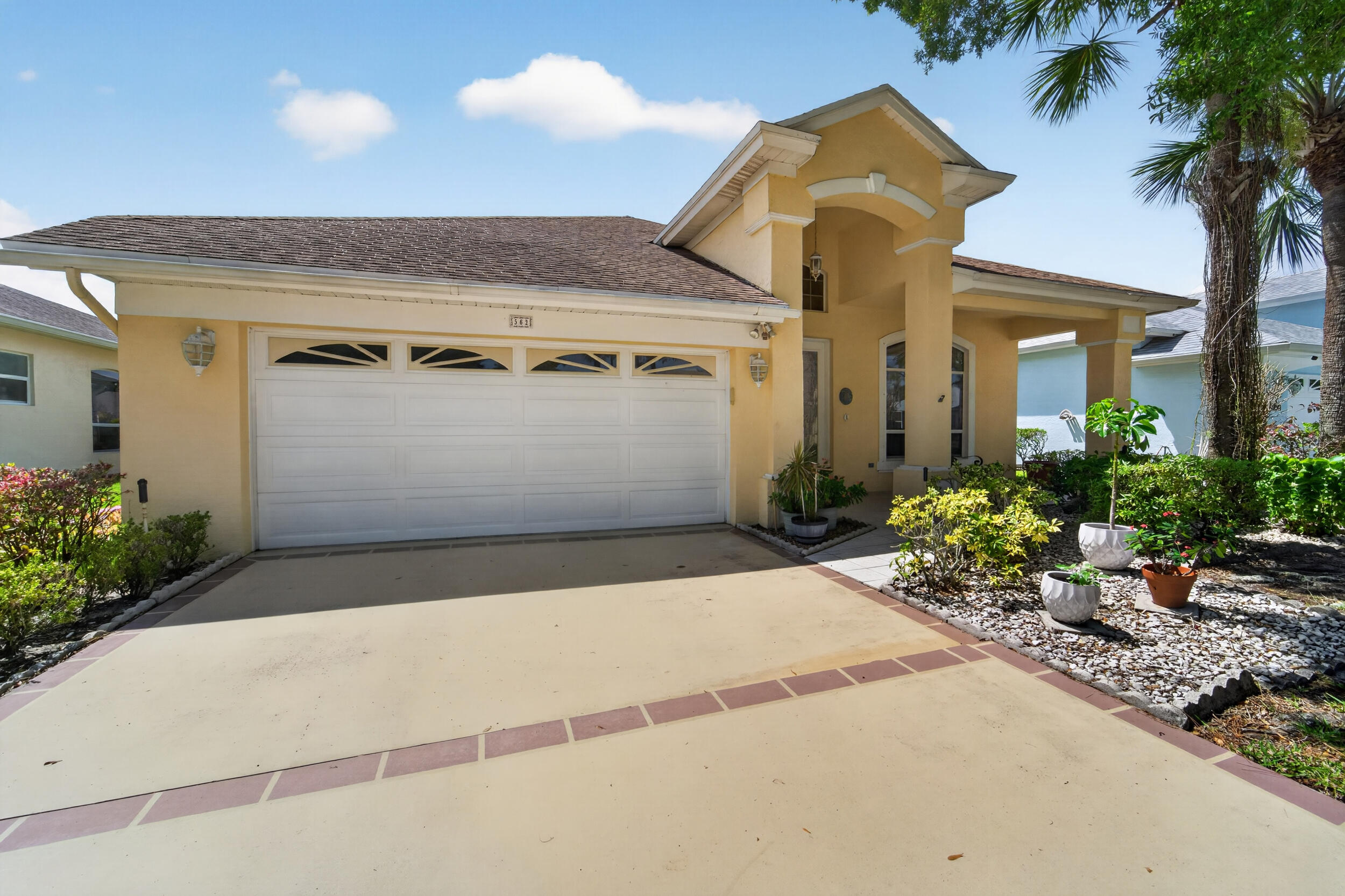 COMING SOON: Wake up to breathtaking sunrises over the water from the oversized screened lanai of this waterfront home in Kings Isle, one of St. Lucie West's premier 55+ gated communities! This 2-bedroom, 2-bath residence offers 2,102 SF of living space with a functional split floor plan, generous living and dining areas, and a 2-car garage — all overlooking peaceful lake views. Kings Isle residents enjoy resort-style amenities including a 15,000 SF clubhouse, ballroom, fitness center, pool, tennis, bocce, shuffleboard, and 24-hour manned gate, all included in the HOA. Centrally located near shopping, dining, I-95, and the Tradition medical corridor.