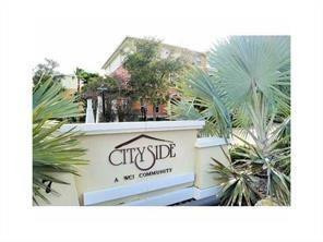 Welcome to this fully furnished two-bedroom, two-and-a-half-bath with den on first floor townhouse in 24 hour gated Cityside Community. This three-story residence offers 1,326 square feet of finished living space, efficiently designed for modern living. The unit includes one garage, providing convenient parking and storage. Very nice Clubhouse with gym and large pool.  Close to shops restaurants, major highways.