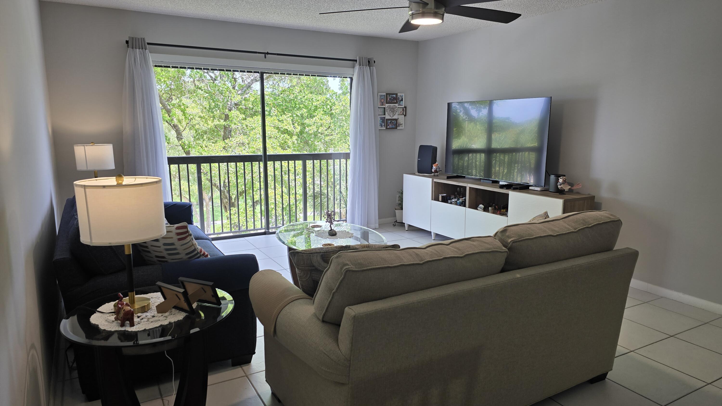 Wake up, grab coffee, and head down to the pool — that's life at Lakes of Carriage Hills. This top-floor 2BR/2BA has tile floors, a walk-in closet, and a vintage-cool vanity nook in the primary bath most units this age don't have anymore. Roof was just replaced. New Elevator, assigned parking, and an amenity package that reads like a resort: pool, tennis, pickleball, shuffleboard, sauna, fitness center, clubhouse, and grill stations out back. All at $163,000 in a 55+ community with HOA covering the essentials. Bring your buyer, this one shows well.