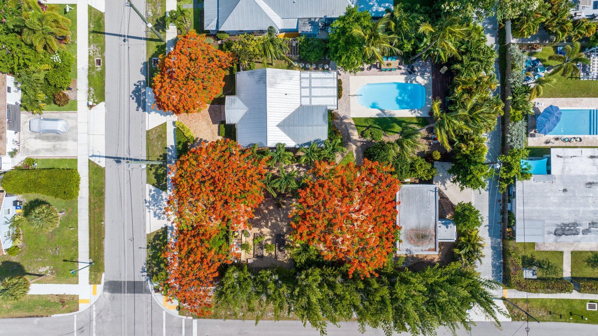 Welcome to this extraordinary private compound in the heart of Osceola Park, just 2 blocks from iconic, Atlantic Avenue in downtown Delray Beach. 

Situated on a premier, full double lot, this magical property offers the rare combination of space, privacy, and walkability. Lush bamboo and mature Areca palms line the fully fenced grounds, creating a serene tropical sanctuary that feels worlds away, yet you're just two blocks from the vibrant energy of Atlantic Avenue's exceptional dining, coffee shops, boutiques,  fitness studios, galleries & entertainment and a quick stroll to the beautiful beach. 

The main residence features a chef-designed kitchen built for cooking and entertaining, renovated in 2019 as well as the primary bathroom. A 2025 A/C and durable metal roof. Beyond the main home, a fully updated guest cottage (complete renovation in 2024 including new roof, stucco, and a full interior remodel) offers endless flexibility, ideal for guests, multigenerational living, a private office, or income potential.

At the center of the compound, a stunning pool anchors the outdoor living space, surrounded by expansive garden areas rarely found this close to downtown. Enjoy a short stroll to the Intracoastal, marina historic neighborhood, and the beach  all while returning home to your own quiet, private retreat.

Whether you're seeking a charming beachside residence, an income-producing property, or envisioning redeveloping this exceptional double lot into two multimillion-dollar homes, the possibilities here are truly unmatched. With premier location, generous lot size, and flexible layout, 304 S.E. 4th Ave offers extraordinary potential in one of Delray Beach's most desirable neighborhoods.

This is more than a home  it's a rare opportunity to create, invest, or simply enjoy the very best of Delray Beach living.