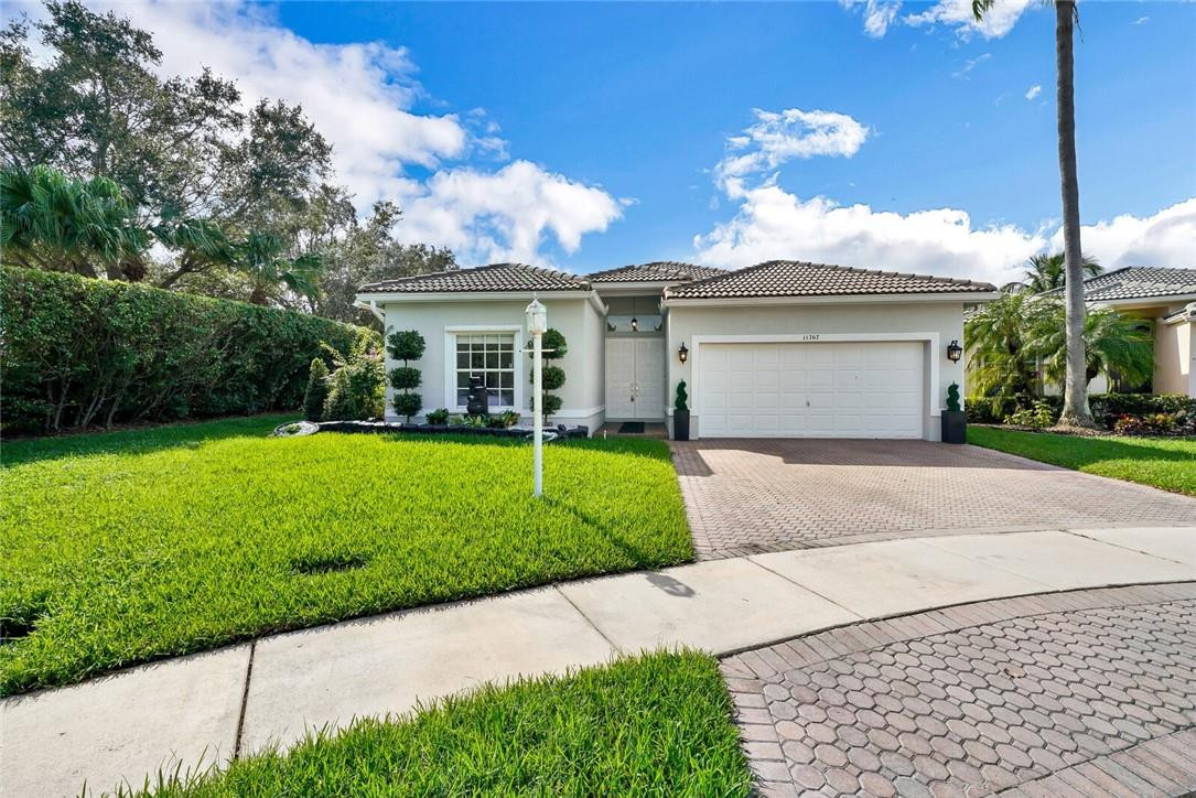 OWNER WILL CREDIT TOWARDS BRAND NEW ROOF AT CLOSING! Beautifully remodeled, freshly landscaped home in highly desirable Wyndham Lakes. Featuring new porcelain tile floors throughout (no carpet), newer AC & W/H, brand new white shaker kitchen cabinets, new high end Stainless Steel appliances, granite countertops, & glass tile backsplash. New Washer & dryer. Open floor plan w/ LED recessed lights, new chandeliers & light fixtures, new blinds & window treatments. Master bedroom features 2 closets (1 XL walk-in). Oversized extended patio w/ recently remodeled pool - new diamondbrite & pool tiles. Freshly painted. Owners did not install baseboards or finish remodeling the master bathroom but it is 80% complete (just needs paint and YOUR finishing touches).