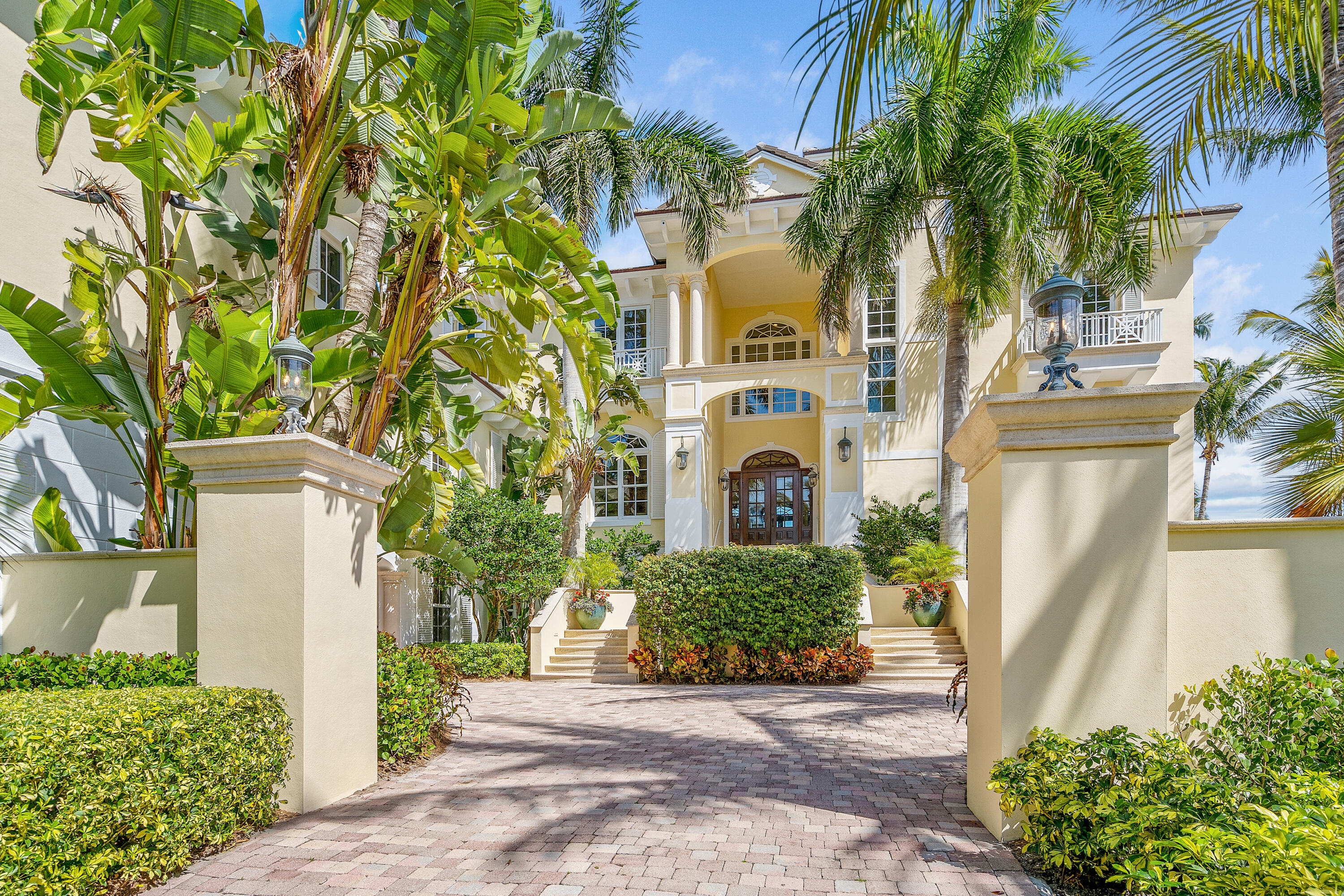 Majestic Oceanfront estate with incredible views, Well-appointed with luxurious features like an infinity edge pool and spa, billiard room, theatre room, private gym with steam room, summer kitchen, expansive lanai, spacious balcony overlooking the beach, guest house, 5 car garage and so much more! 2021 Roof! Located in the gorgeous Orchid Island Golf and Beach Club with many wonderful amenities.