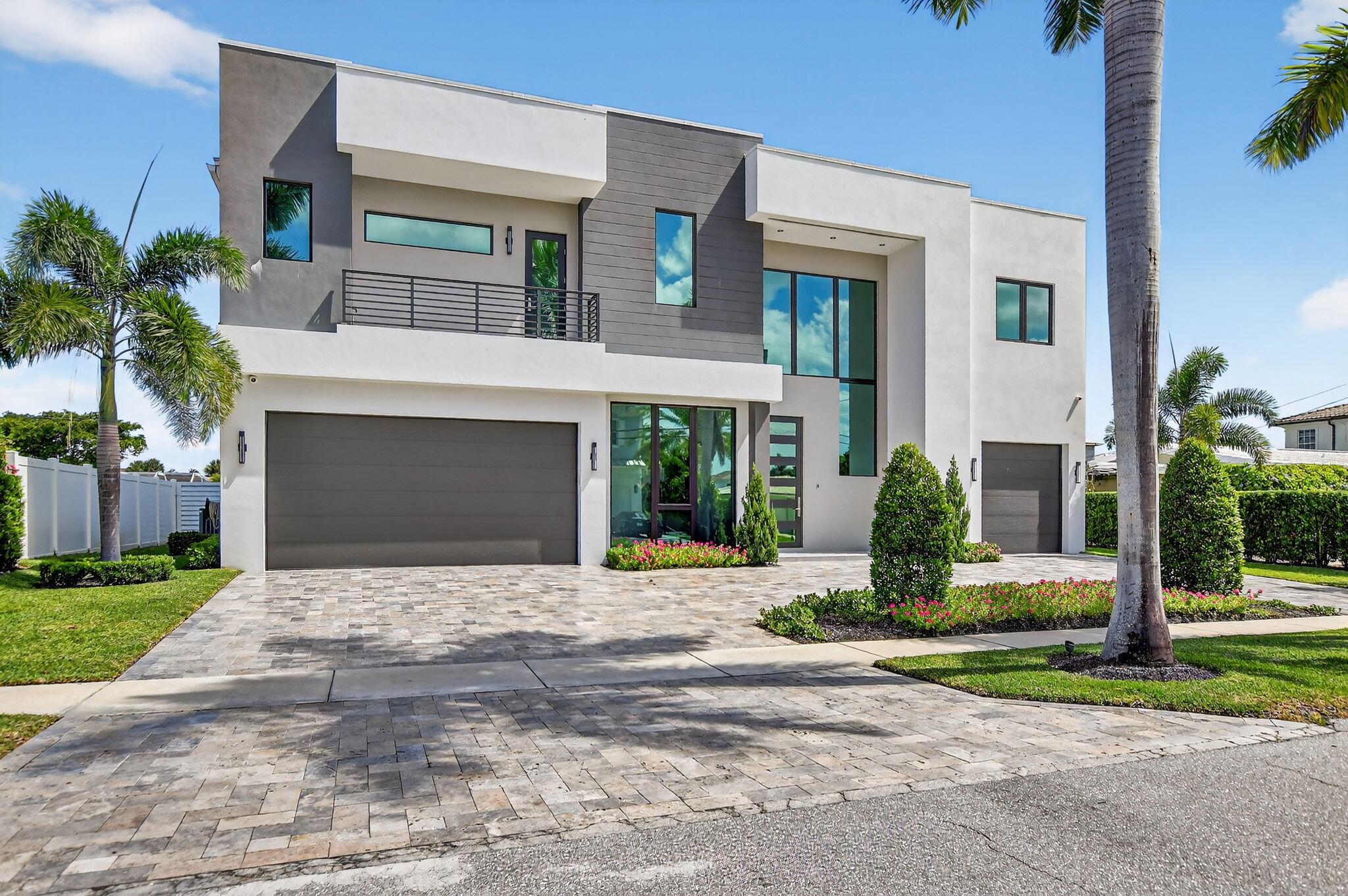 Welcome to this exquisite 2021 constructed residence nestled in Boca Harbour of Boca Raton, FL. This stunning home is a testament to modern elegance, offering a harmonious blend of luxury and sophisticated design. Spanning an impressive 8,250 square feet of total lot space, this magnificent property features 6 spacious bedrooms and 6.5 luxurious bathrooms, each thoughtfully crafted to provide ultimate comfort and style. The grand entrance welcomes you with soaring ceilings and an abundance of natural light, accentuating the home's open and airy feel. The gourmet kitchen is a culinary masterpiece, equipped with top-of-the-line Thermador appliances, sleek cabinetry, and a generous island that serves as the centerpiece for both cooking and entertaining. The expansive living areas flow seamlessly inside and out, offering versatile space for relaxation and gatherings. 

Retreat to the primary suite, a serene sanctuary with an opulent en-suite bathroom featuring a spa-like soaking tub and a spacious walk-in shower. Each additional bedroom offers its own en-suite bathroom, ensuring privacy and convenience for all residents.

Step outside to discover a private oasis, perfect for entertaining or enjoying peaceful moments. The beautifully landscaped grounds provide an idyllic setting for the sparkling pool, summer kitchen, and outdoor lounging.

Experience the pinnacle of luxury living at 725 Northeast 71st Street, a home that truly embodies elegance and modern sophistication.

Key Features:
Elevator and Smart Home System: Enjoy the convenience of an elevator and a state-of-the-art smart home system. Plus, two electric vehicle charging ports in the 2-car garage. 

Gourmet Kitchen: The heart of the home features a gourmet kitchen equipped with an oversized island and top-of-the-line Thermador appliances.

Resort-Style Outdoor Living: Bask in calming waterway views from every corner of the home. The resort-style patio is an entertainer's dream, complete with a full summer kitchen and a large family pool featuring a sun shelf.

Boater's Paradise: This no-fixed-bridge deepwater estate boasts 82.5 ft. of seawall with a 50 ft. concrete dock.

Generac Generator: Equipped with a 25KW Generac Generator with smart switching, ensuring seamless entire house operation during power outages, valued at $25K.

Sophisticated Interiors: The home features motorized window shades and drapes, Lutron dimmers, timer switches for bathroom fans, a decorative TV wall unit, and a stylish office with pocket door, easily used as a 6th bedroom.

Personal Property Items Included: The camera DVR unit and audio panel will convey with the sale.

Optional Personal Property Purchases: All TVs, including the outdoor TV, are available for an additional $15K. Sonos devices (excluding one personal sub) are available for $6K.

Exclusions: The network switch, battery backup, network drives, Sonos amps, power supplies, monitor and mouse, and all patch cords and cables are not included in the sale.

DISCLAIMER: Information published or otherwise provided by the listing company and its representatives including but not limited to prices, measurements, square footages, lot sizes, calculations, statistics, and videos are deemed reliable but are not guaranteed and are subject to errors, omissions or changes without notice. All such information should be independently verified by any prospective purchaser or seller. Parties should perform their own due diligence to verify such information prior to a sale or listing. Listing company expressly disclaims any warranty or representation regarding such information.