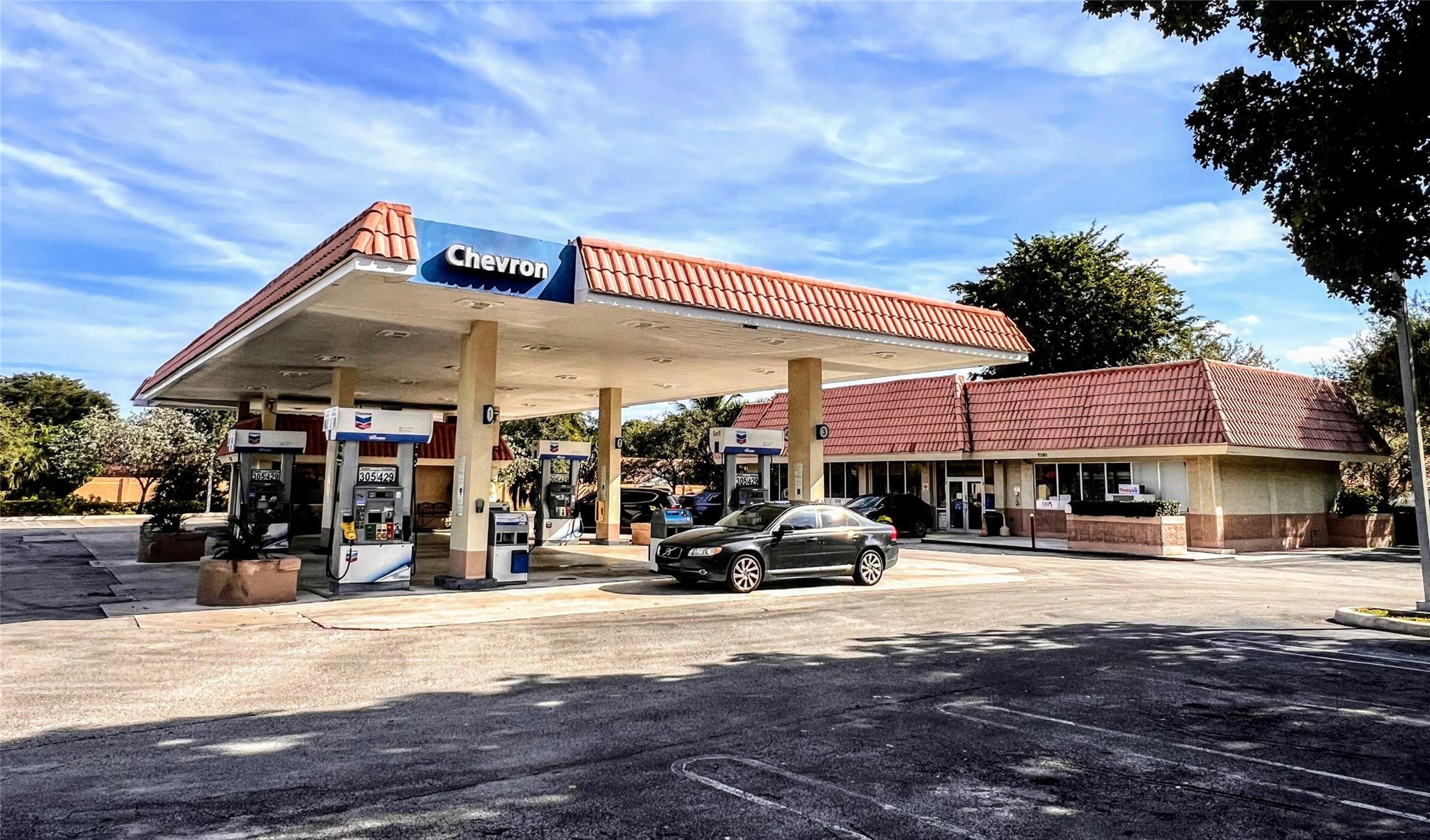High-visibility, free-standing gas station located on a signalized corner in affluent Coral Springs, FL. Situated on a 0.90-acre parcel with over 200 feet of Wiles Road frontage and exposure to approximately 27,500–35,404 vehicles daily. The property features an approximately 2,898 SF retail building suitable for a convenience store, QSR, and additional retail uses. B-3 commercial zoning allows for continued fuel operations or repositioning for auto service, drive-thru retail, or medical/commercial use (subject to city approval). Excellent value-add potential through expansion or added income streams. Located in a strong trade area with median household incomes near $95,000, offering stable income and long-term upside.