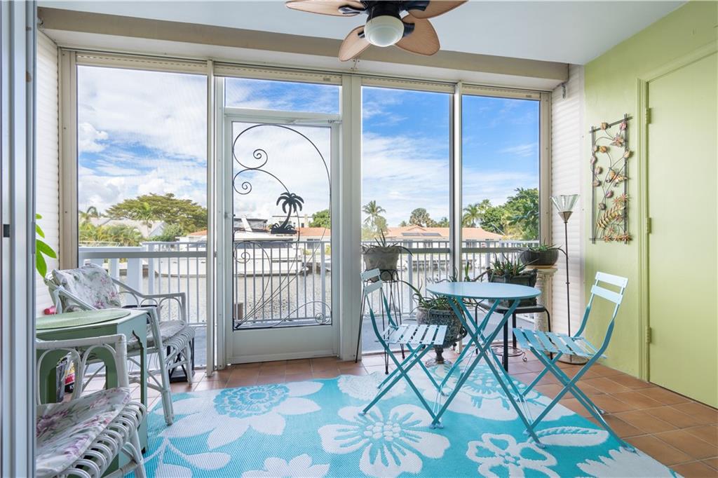 Looking for a great winter home or do you live in Florida full time? Come see this corner 2 bedroom / 2 Bath open kitchen with island, screened in patio / Florida room with electric shutter and access to a extended size balcony. Beautiful Herringbone flooring, Impact windows. Heated pool, boat dock up to 50ft (see attached boat rules & spaces request) Association has undergone extensive building improvements. One dog up to 25 lbs (non aggressive breeds) or one cat, Okay to lease 2nd year of ownership.