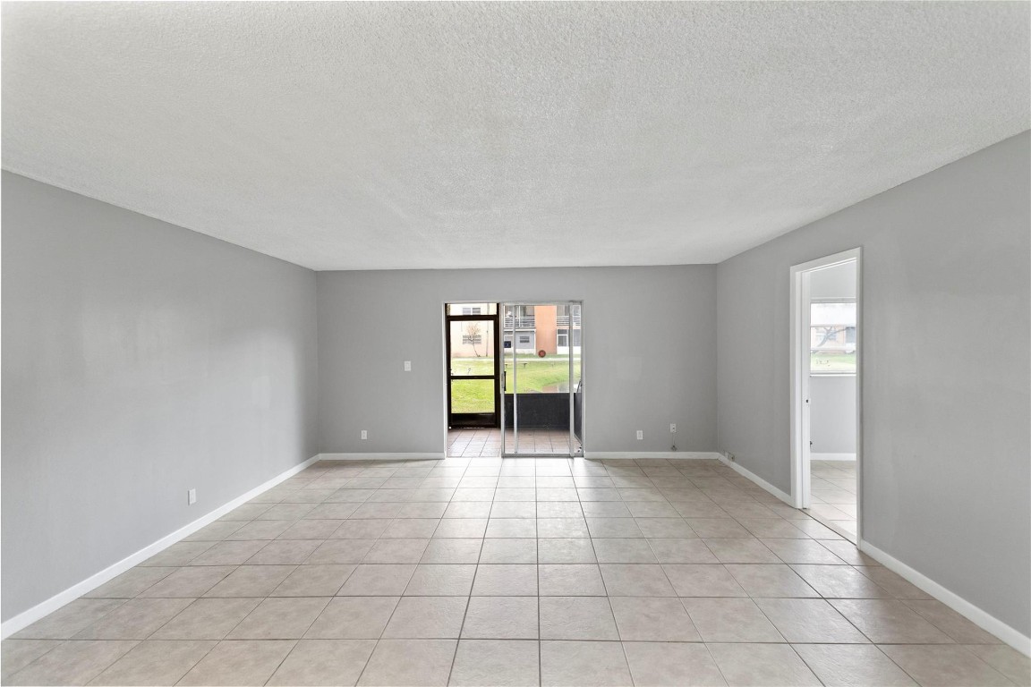 Fully Remodeled Spacious 2-Bedroom 1.5-Bathroom located at the Gardens of Lauderhill Community. This First Floor unit has Tile throughout & Screened Patio with Lakeview. Super Nice Kitchen with Brand New Appliances! HOA Includes Building Exterior, Common Area, Elevator, Insurance, Laundry Facilities, Landscaping/Lawn Maintenance, Parking, Pool Service, Reserve Fund, Roof Repairs, Sewer, Trash Removal & Water. Close to Everything I-95, Shopping Plaza's, Restaurants, Parks, Malls and much more! All ages Welcome! Assigned Parking with Plenty of Guest Parking. LOOK NO FURTHER THIS CONDO IS A MUST SEE! SEE IT! LOVE IT! BUY IT!