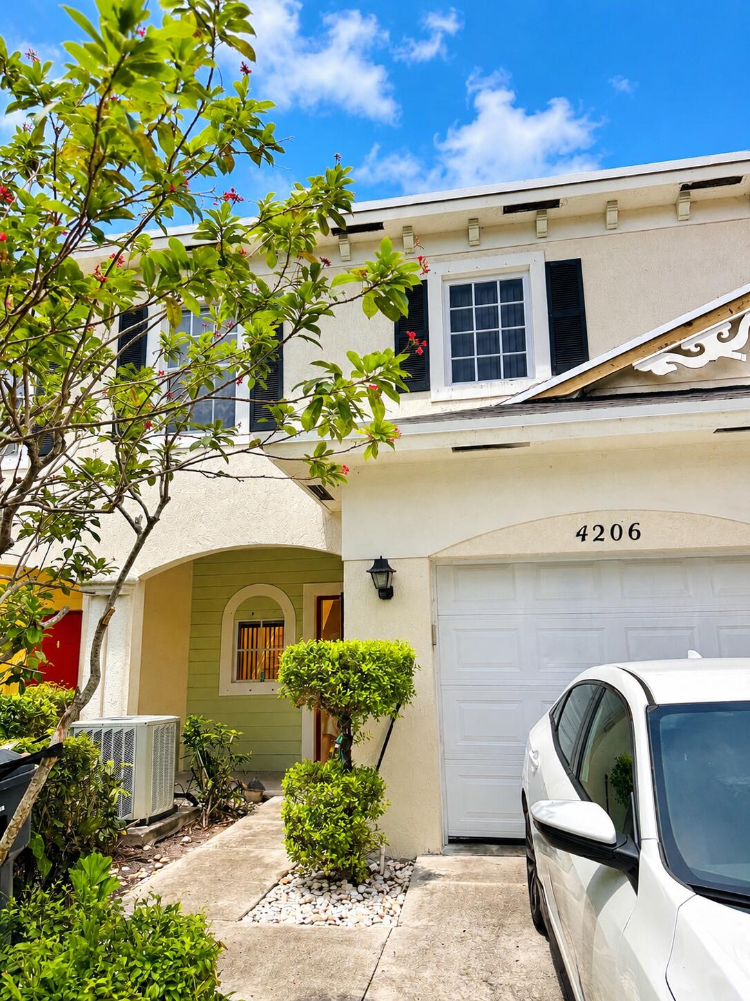 Beautiful lakefront 3-bedroom, 2.5-bath townhouse in the highly desirable Emerald Lake Townhomes community. This spacious home offers 1,674 square feet of living space with an open-concept floor plan, abundant natural light, and an attached one-car garage. Enjoy peaceful lake views from your private patio and the primary suite. The new roof has been paid in full with no special assessment. HOA is only $300 per month and includes access to the community pool and beautifully maintained common areas. Pets are welcome, and rentals are permitted, making this property ideal as a primary residence, vacation home, or investment opportunity. Conveniently located directly across the street from Palm Beach State College and just minutes from shopping, restaurants and major highways.