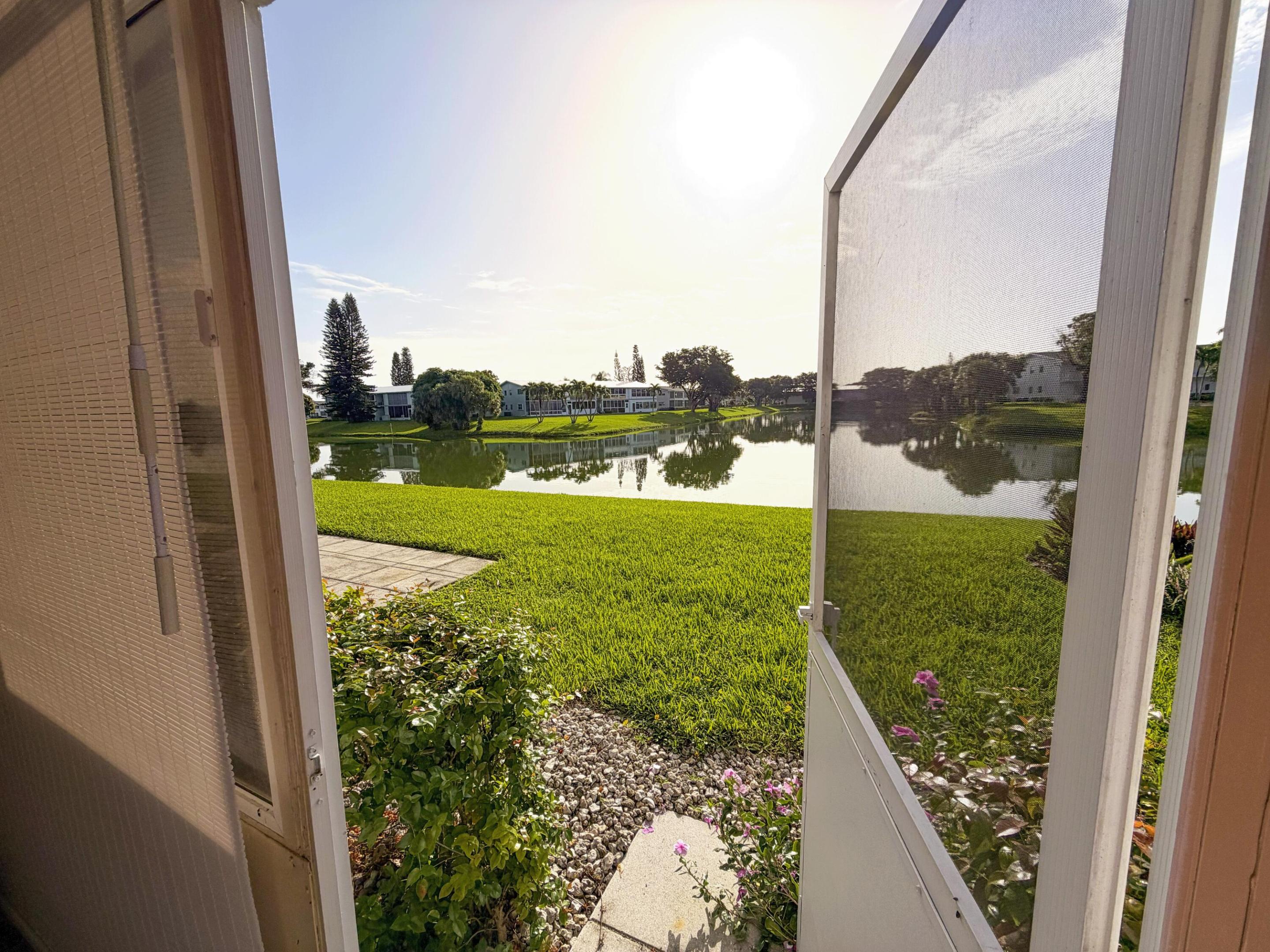 Welcome to your FIRST-FLOOR, LAKE VIEW, 1 BEDROOM CONDO in the renowned Century Village West Palm Beach! This condo comes FULLY FURNISHED, just bring your toothbrush and start living the relaxing south Florida 55+ lifestyle you always dreamed of! Beautiful lake view off your patio, open kitchen floor plan, with newer A/C units. For those looking to plan for a comfortable future without the pain of walking up and down stairs to get to your home, this is the one for you. CAN BE RENTED AFTER 2 YEARS OF OWNERSHIP. Private patio can be built outside lanai with association approval.