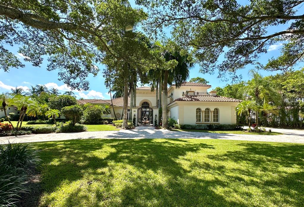 First time on the market since new. Designed by Shane Ames of Ames International Architecture. Built in 1999 by Courchene Development Corp. This absolutely beautiful home is set on one of Long Lake Estates best lakefront lots. Sitting on over an acre this classic Palm Beach style house has a fantastic flexible floor plan. Be wowed by the impressive scale and views of the pool deck landscaping to the lake. The living room has open views to the courtyard with fountain, the 50ft pool, gardens and lake. High flat ceilings throughout. Massive master bedroom suite ground floor with huge walk-in-closets, two bathrooms, two attached flex rooms that can be an office, gym or nursery. Also on the main living area you will find an inviting kitchen with gas cooktop, bar, family room, dining room, breakfast area, cabana bath, entry powder room, library, bedroom, and windowed laundry room. 4 car garage. Upstairs there are 3 ensuite bedrooms, one with a large balcony and a loft. Partial impact glass windows. Room for large expansion including multiple garages and guest house. Roof less than 3 years old. 120 Gallon water heater installed 2021. Private dock for canoeing and kayaking. Long Lake Estates is one of Boca Raton's most exclusive guard gated communities. See Floor Plan.