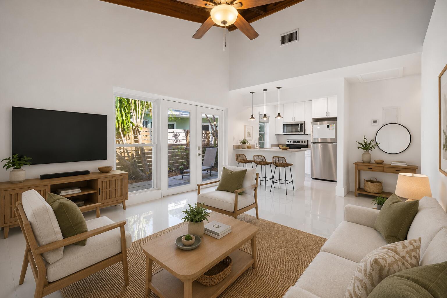 Bright and open 1-bedroom, 1-bathroom featuring unique vaulted wood beam ceilings and a private fenced courtyard — a rare find in this price range. This beautifully updated unit offers tile floors throughout and a modern kitchen with white shaker cabinetry, quartz countertops, and stainless steel appliances. Enjoy your own private outdoor space — perfect for relaxing or entertaining. Ideally located just south of Downtown Fort Lauderdale with quick access to Las Olas, the beach, dining, shopping, Fort Lauderdale Airport, and major highways.