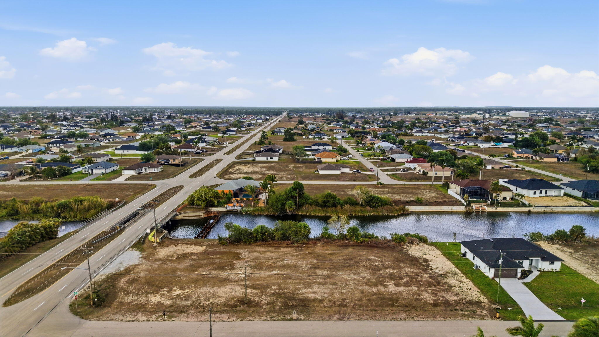 Clear lot on a freshwater canal in growing NW Cape Coral. Located just minutes from schools, shopping, dining, and golf, with excellent access to nearby major roads. The property is located in a fast-growing region in Cape Coral where new homes are popping up all around. You will also enjoy fishing from your own backyard and watching the SWFL wildlife play and hunt. Ideal for boating, kayaking, and enjoying the freshwater canal lifestyle. This property is perfect for homeowners or investors looking for a high-potential lot in one of Cape Coral's fastest-growing areas. Don't miss this opportunity!