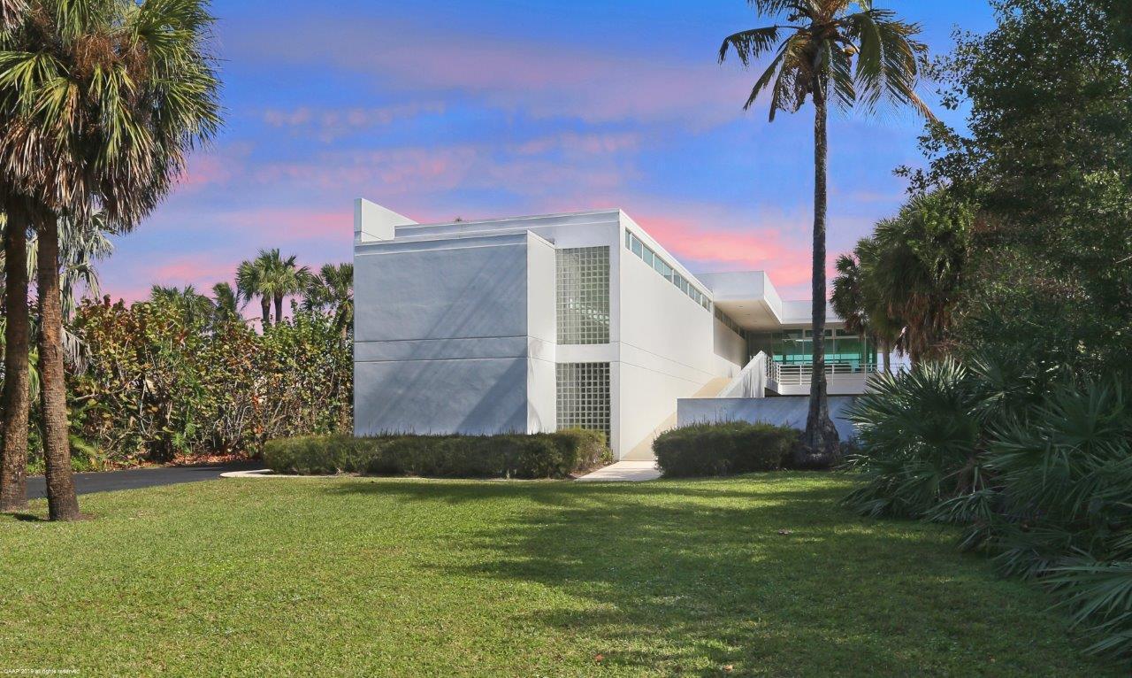 SPECTACULAR CONTEMPORARY DIRECT OCEAN FRONT HOME ON JUPITER ISLAND. NEARLY AN ACRE WITH 100 FEET OF BEACH FRONT. INSPIRED BY LE CORBUSIER AND DESIGNED BY ALBERTO ALFONSO OF TAMPA. OPEN AREA CONCEPT WITH GLASS AND INCREDIBLE OCEAN VIEWS. ONLY 30 MINUTES TO PALM BEACH INTERNATIONAL AIRPORT AND 15 MINUTES TO STUART JETPORT.