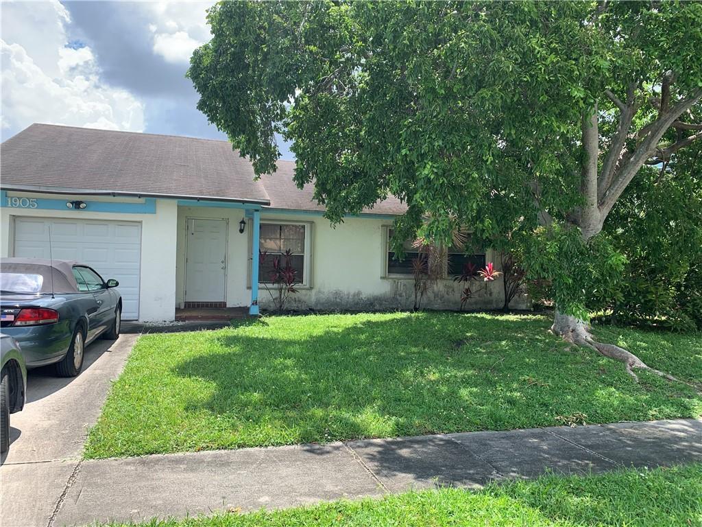 Lowest price house in the neighborhood. 2/2 w Pool & garage. Quiet family friendly neighborhood close to shops, entertainment, parks and access to major roads lots of space, accordion shutters on all windows and doors, private backyard with in-ground pool. AC - replaced 2021or 2022 as per seller. Washer/Dryer in house