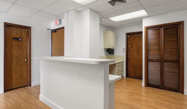 Special Opportunity for a fully leased four-story medical and professional office building totaling approximately 30,537 SF located in Pompano Beach, Fl; also includes a near auxilia parking lot.  Elevator and window upgrades all recently; currently completing a 50-year building safety inspection with structural work finished. Located north of Atlantic Boulevard and just west of the Intracoastal, with upper floors offering partial water views.  There are 16 Suites in total ranging from 663 SF to 4,758 SF, accommodating a mix of medical and professional offices all are flex configurable to accommodate tenants.   On-site surface parking and fully gated covered parking for staff, patients, and visitors. With only one unit available for lease. The subject property has a newly renovated lo