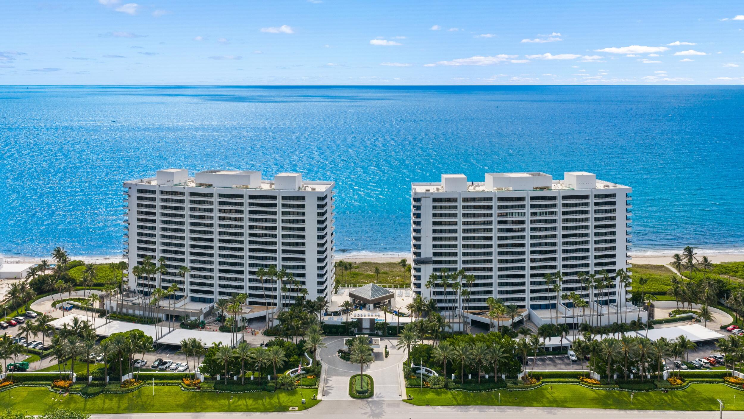Welcome to Residence 1505-S at Addison on the Ocean, one of Boca Raton's most prestigious oceanfront addresses. This exceptional lower penthouse residence encompasses 2,792 square feet of meticulously redesigned living space and underwent an extensive designer renovation in 2023, blending timeless elegance with modern sophistication while showcasing breathtaking direct East Ocean views and spectacular sunset vistas from its western terraces.  Spanning a desirable flow-through floor plan, this impeccably appointed residence offers three spacious bedrooms, each with its own en-suite bathroom, plus a beautifully redesigned powder room.  Arrive via a semi-private elevator foyer, where a custom handmade medallion immediately sets the tone for the exceptional craftsmanship and attention to detail found throughout the home.  Designed by Clive Daniel Home, the interiors feature new flooring throughout, dramatic wraparound ceiling lighting in the living room, dining room, and kitchen, and thoughtfully curated finishes that create a refined yet comfortable coastal ambiance. Crafted for the discerning chef, the gourmet kitchen pairs striking Cambria Quartz countertops with an exceptional suite of Wolf appliances, a Sub-Zero refrigerator and freezer, and a built-in Miele coffee system, creating a refined space where form and function coexist effortlessly.  Floor-to-ceiling glass frames unobstructed ocean views, filling the residence with natural light and seamlessly connecting indoor and outdoor living spaces. The expansive eastern terrace provides the perfect setting to enjoy sunrise views over the Atlantic, while western balconies offer stunning sunset panoramas over the city skyline and Intracoastal.  Residents of Addison on the Ocean enjoy an unmatched resort-style lifestyle with full-service beach and pool attendants, two heated oceanfront swimming pools, an oceanfront restaurant and bar, on-site café, state-of-the-art fitness center, residents' lounge and game room, and exceptional white-glove service. The community is further enhanced by a manned gated entrance, 24-hour security, and two dedicated garage parking spaces.  Positioned along Boca Raton's coveted coastline, Residence 1505-S represents a rare opportunity to own a fully renovated, move-in-ready lower penthouse in one of South Florida's most exclusive beachfront communities.