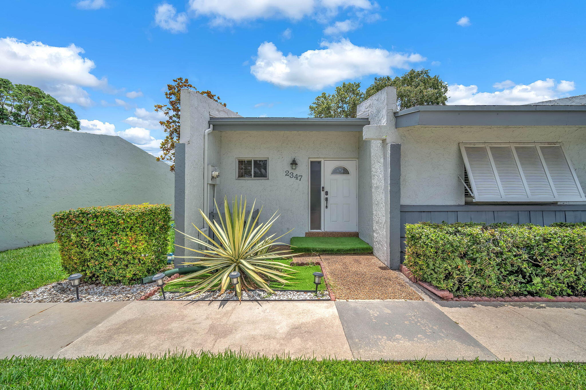 Welcome to this beautifully maintained 2-bed, 2-bath villa in one of Hollywood Hills' most exclusive communities, fewer than 94 homes! Enjoy a renovated kitchen (2020), brand-new waterproof laminate floors (2024), new roof (2024), and hurricane shutters. The private patio is perfect for outdoor relaxation, plus two assigned parking spots right at your door. Community amenities include a pool and tennis court, with HOA covering landscaping, maintenance, and garbage service. Just 5 minutes to Downtown Hollywood's dining and nightlife, close to Hard Rock Hotel & Casino, 5-10 minutes to Hollywood Beach, and easy access to I-95, Turnpike, and Fort Lauderdale Airport. Move-in ready — ideal for first-time buyers or investors. Can be rented right away!