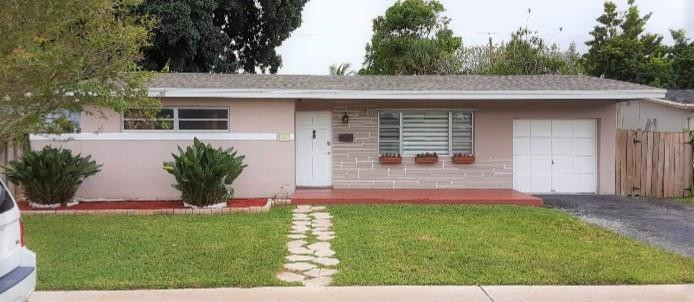 Beautiful Single Home two blocks from University Dr. - House features two bedroom and two bathroom and garage was converted into a third bedroom - Beautiful Kitchen with Stainless Steel Appliances - Tile & Laminate  floors throughout the house - Fully Fence Backyard with a nice deck for the enjoyment of love ones - Laundry room with cabinets - ROOF JANUARY 2021 - A/C MAY 2019 (10 YEARS WARRANTY)  - No HOA- PET FRIENDLY. A must see!