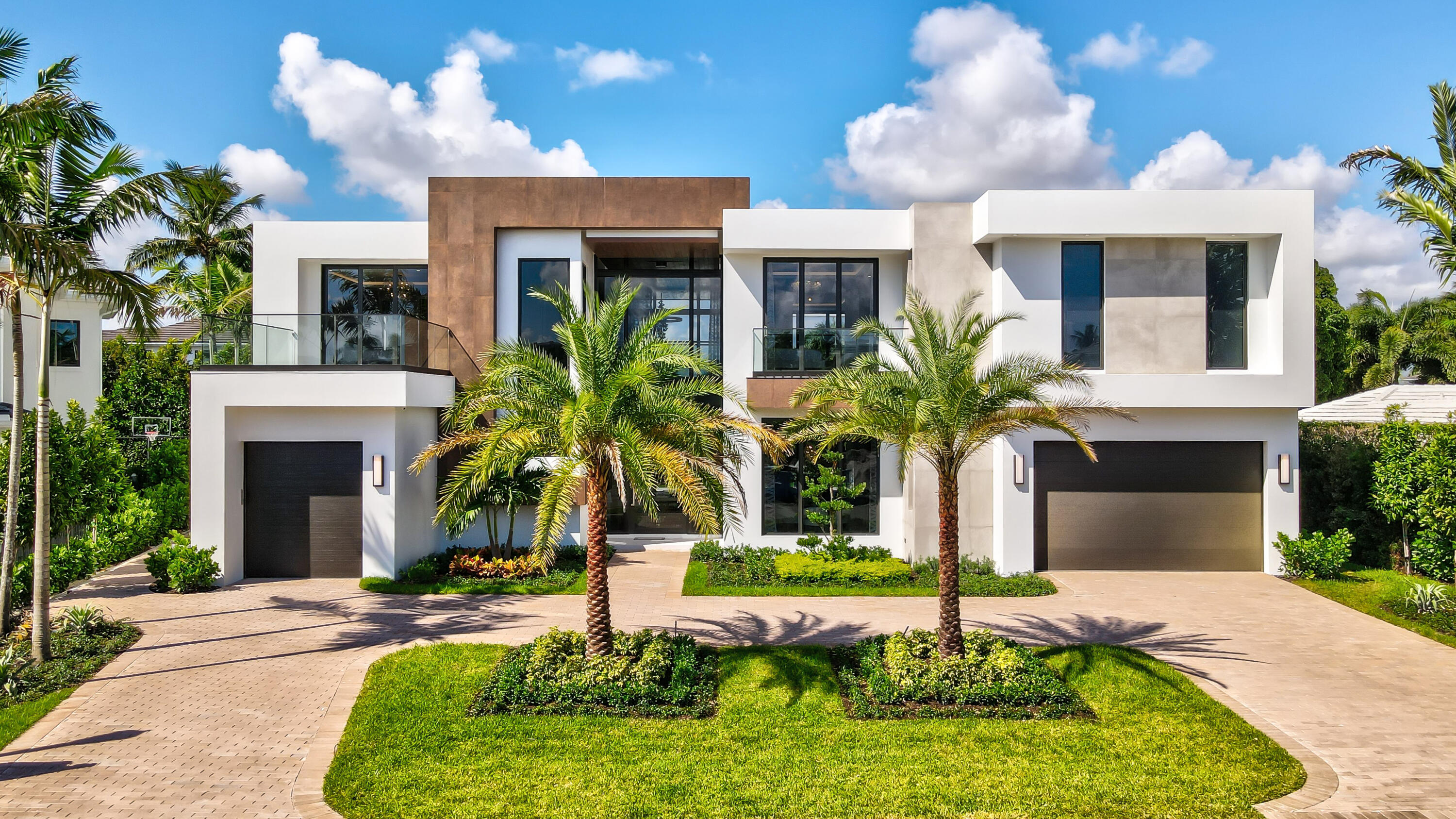 2391 Areca Palm Rd.  Modern Estate located in the world-renowned Royal Palm Yacht & CC, Architect, Elmar Benavente at BE Design, Built by Albanese & Sons Group. Turnkey by Zelman Style Interiors. This Estate features 5 BR,6.1 BA's, 8,090 Ttl Sq. Ft. Impact Windows, Custom Kitchen w/top of the line Miele Appl's, Quartzite Counter-tops -double thick edge, Custom Cabinets, Carrara European imported porcelain 48 x 48 Tile, Family Room, Outdoor Loggia w/ Entmt area. 2 Story Great RM w/Fplc Formal Dining RM, Wine Closet, 1 En-suite BR w/ Walk-In Closet, Custom Lacquer Bar w/ Quartz in club, Laundry Room,3 Car+ Golf Cart Gar. 2nd Floor Extra Lrg. Master Suite w/ double Closets & Over sized BR w/Claw Tub, 3 En-Suite BD w/ balconies, Family Rm & Elevator. First Floor Features: Carrara European imported porcelain 48 x 48 Tile, Custom Made State-of-the-Art Kitchen with Lacquered finish cabinetry, Quartz countertops, Miele fully inter-graded appliances, Miele 48" Hood, Miele Coffee Barista, walk-in pantry. Formal Dining Room with floating built-in server, Custom built fireplace with 10x4 imported slabs from floor to ceiling along with imported wood paneling, 2 story Great Room, Playroom/Great Room En-Suite with Walk-In Closet, Walk-In Wine Room, and Bar Area, En-Suite Bedroom with Walk-In Closet, oversize Laundry Room with Electrolux washer & dryer, Elevator, Central Vacuum  Second Floor Features: Floating Staircase surrounded by Frameless Glass, Second Family Room/Great Room with custom made Lacquer Bar with Quartz counter-top, ice-maker & Refrigerator, Striking Master Suite with His & Hers Bathrooms & Walk-In Closets & fireplace, 3 En-suite Bedrooms with Walk-In Closets and Balconies.  Outside Features: 3 Car+ Golf Cart Garage, Frame-less Glass railings on all Balconies, Summer Kitchen with Built in BBQ area, Veranda with Imported porcelain tile, Resort Style Pool & Spa with wet sunning deck.   Additional Features: Best Location In Boca Raton, Royal Palm yacht and Country Club! New Construction,24-Hour Security, Steps from The Boca Raton Resort, Walking Distance to the Beach, One of the Most Luxurious & Exclusive Communities in Boca Raton, Furnished Within 30 minutes from Ft. Lauderdale & West Palm Beach airports. Some photographs were taken during a prior marketing campaign and may not reflect the property's current furnishings, decor, or staging.