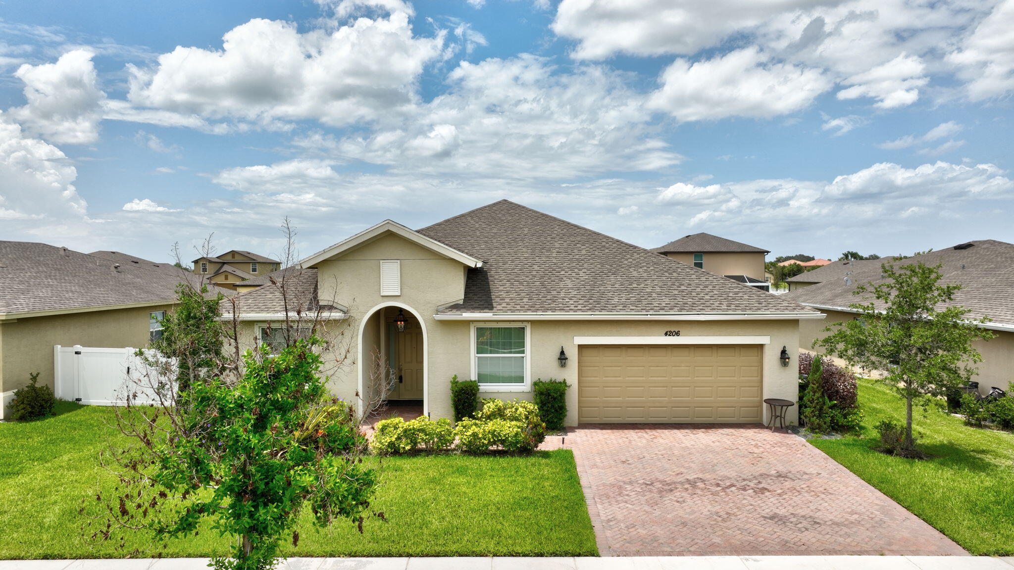 Welcome to this charming 4 bed, 3 full bath, 2 car garage home in the newly built and desirable community of Bent Creek in Fort Pierce. Built in 2019, this move-in-ready residence boasts 2055 of comfortable living space. Open concept with a split floor plan for added privacy. Inside, you'll find a modern interior with stylish finishes, including tile in main areas. The kitchen is equipped with stainless appliances, quartz countertops (including large kitchen island), and wood cabinetry. Both bathrooms have been upgraded with luxury vanities, adding a touch of sophistication and spa-like comfort. Step outside to a spacious fenced backyard with a pergola, the perfect setting for relaxation and entertaining. This property is designed for ease and peace of mind, featuring a sprinkler system, i Welcome to this charming 4 bed, 3 full bath, 2 car garage home in the newly built and desirable community of Bent Creek in Fort Pierce. Built in 2019, this move-in-ready residence boasts 2055 of comfortable living space. Open concept with a split floor plan for added privacy. Inside, you'll find a modern interior with stylish finishes, including tile in main areas. The kitchen is equipped with stainless appliances, quartz countertops (including large kitchen island), and wood cabinetry. Both bathrooms have been upgraded with luxury vanities, adding a touch of sophistication and spa-like comfort. Step outside to a spacious fenced backyard with a pergola, the perfect setting for relaxation and entertaining. This property is designed for ease and peace of mind, featuring a sprinkler system, insulated garage door with opener. Meticulously maintained and like new, this home is the perfect blend of elegance, convenience, and comfort. Bent Creek offers outstanding amenities, including a clubhouse with a resort-style pool, fitness center, tennis and basketball courts, playground, and a security gate for added peace of mind.