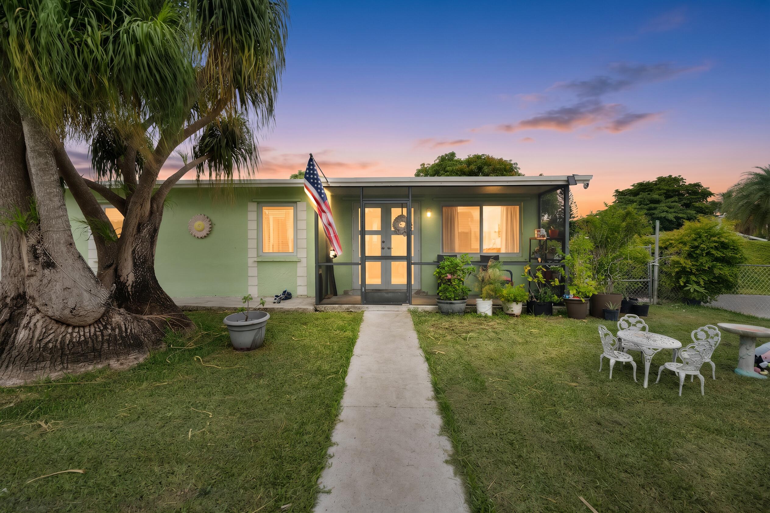 Don't miss this charming 4-bedroom, 2-bath home on a spacious corner lot in a quiet cul-de-sac with NO HOA. Featuring impact windows and doors throughout plus a surveillance system, this home offers added peace of mind and plenty of room for your RV, boat, trailer, or extra vehicles. Inside you'll find a bright, open living area, oversized eat-in kitchen, tile flooring throughout, and spacious bedrooms. Step outside to a large fenced backyard that is perfect for entertaining, gardening, or adding a pool, and includes a delicious mature mango tree. This home is conveniently located near shopping, dining, schools, parks, and major highways, this home offers privacy, flexibility, and exceptional value with no association restrictions. A must-see!