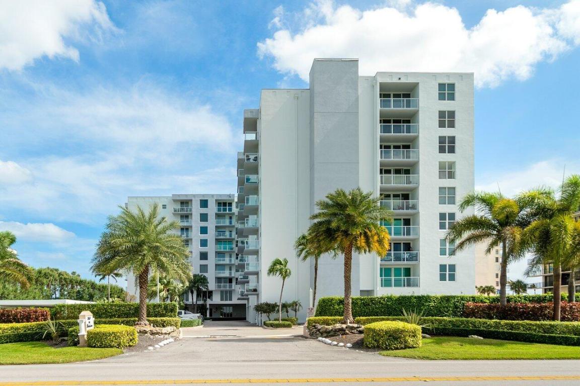 If you Dreamed of living on the Ocean, this is a great opportunity. Make beachfront living your reality in this beautifully updated and fully FURNISHED TURN KEY condo, ideally located whether you're staying on the island or heading out of town. This spacious unit features a desirable split floor plan with two en-suite bedrooms, both offering stunning views of the ocean and pool. Freshly painted throughout, the condo boasts all-new lighting with Casetta Smart Switches, impact windows, and upgraded electrical panel for peace of mind and modern convenience. Highlights Include: New toilets, faucets, and shower controls, Custom closet systems, Keyless entry, fully alarmed with central station monitoring, CCTV system with DVR recording. Brand new TVs with surround sound and universal remotes, Dryer hookup installed. Enjoy resort-style amenities including a recently renovated Oceanside pool and deck with a gorgeous outdoor kitchen, a well-appointed fitness center, and a welcoming lobby with full-time concierge service. Whether it's your full-time home or a luxurious getaway, this condo has everything you need to live the South Palm Beach lifestyle.