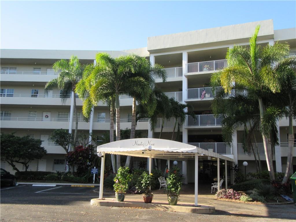 Welcome Home to this wonderful light and bright three bedroom two and a half bath condo in Palm Aire Country Club.  This "F" model home was originally set up as a three bedroom, easily converted back, but now features a large open living/dining/den area with custom built-ins for extra storage. This lovely home features impact windows, tile and bamboo flooring, separate laundry room, walk-in closets and an eat-in kitchen. Watch the golfers on the 16th hole  during the day or the sunset in the evenings from your wonderful screened in balcony. Additional storage comes with this home, as well as, one assigned parking space. Well run and financially secure building with newly installed security cameras.  Call to arrange your private showing today. Welcome Home to this wonderful three bedroom two and a half bath condo in Palm Aire Country Club.  This "F" model home was originally set up as a three bedroom, easily converted back, but now features a large open living/dining/den area with custom built-ins for extra storage. This lovely home features impact windows, tile and bamboo flooring, separate laundry room, walk-in closets and an eat-in kitchen. Watch the golfers during the day or the sunset in the evenings from your wonderful screened in balcony. Additional storage comes with this home, as well, as, one assigned parking space. Call to arrange your private showing today.