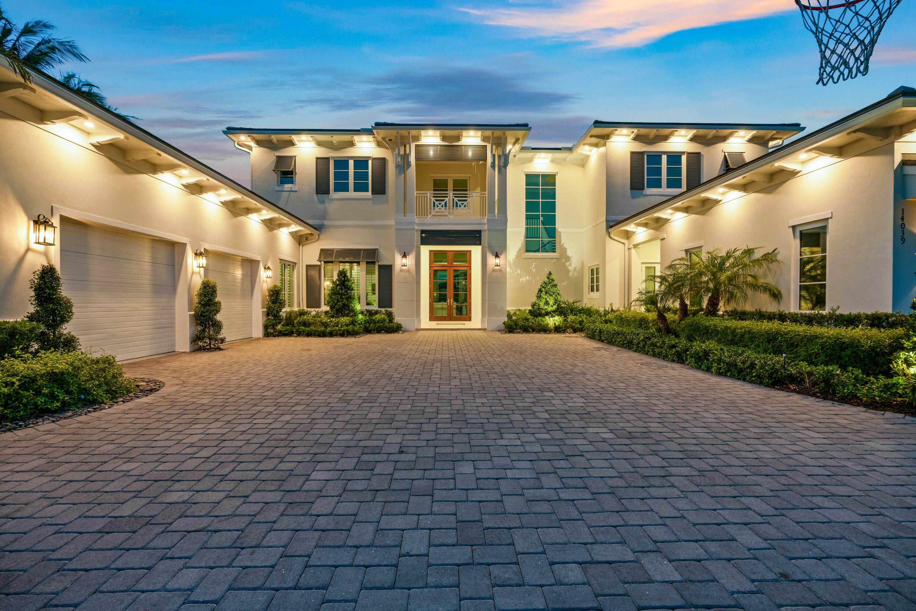 NEWER WATERFRONT ESTATE BY HOBGOOD CONSTRUCTION. Built in 2019, this home has become a fisherman's paradise! Full 1-car garage transformed into a bait and tackle room, 110 LF of waterfront, open dock space and boathouse! 21K and 16K lifts plus 600lb ice maker! Enjoy a relaxing pool oasis with tranquil waterfall from the pergola. Custom floor plan offers water views from nearly every living space. Grand two-story foyer, formal living room with gas fireplace and views of the pool, true chef's kitchen with double islands, Thermador appliances and hidden pantry plus a casual family room looking out to the entertaining area. Spacious lower level master suite with expansive water views, wet bar with beverage cooler, luxurious master bath with walk-through shower and ample closet space.