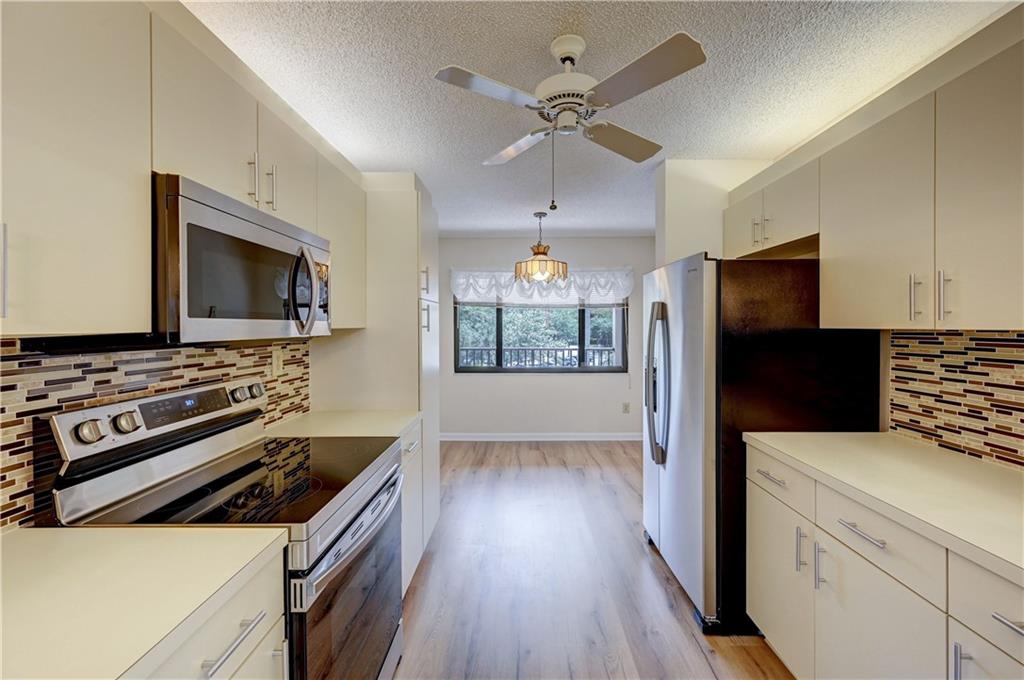 Amazing opportunity to own in Clairmont G @ Kings Point. This 3rd floor unit features: New impact windows/doors, New 2020 AC, extended living room w/New Flooring throughout, new carpet in bedrooms, updated eat-in kitchen w/SS appliances & decorative backsplash, master suite boasts walk-in closet & updated bath w/dual sinks. Amazing lake views from living room & master. Laundry room w/full size washer/dryer. Unit is close to stairs & New Elevator. Maint.fee includes cable/internet,water/trash,insurance,lawn,roof, bldg exterior & common areas. Verified 55+ Kings Point offers tons of activities! Amazing amenities include 24 hr. guard gate, State-Of-The-Art Performing Arts Theatre,heated pool,clubhouse,gym,BBQ area,tennis courts,shuffleboard +more! Deed paid in full & Blg Financials excellent. Amazing opportunity to own in Clairmont G at Kings Point. This 3rd floor unit features: New impact windows/doors, New 2020 A/C, extended living room w/laminate floors, new carpet in bedrooms, updated eat-in kitchen w/SS appliances & decorative backsplash, master suite boasts walk-in closet & updated bath w/dual sinks. Amazing water views from living room & master. Laundry room w/full size washer/dryer. Unit is close to stairs. Maintenance fee includes cable/internet, water/trash, insurance, lawn/landscaping, roof, building exterior & common areas. Verified 55+ Kings Point offers tons of activities! Amazing amenities include 24 hr. guard gate, State-Of-The-Art Performing Arts Theatre, heated pool, clubhouse, gym, BBQ area, tennis courts, shuffleboard +more! Deed paid in full. PER ASSN: No leasing, No pets, 20% min down, 700 credit & $35k min income