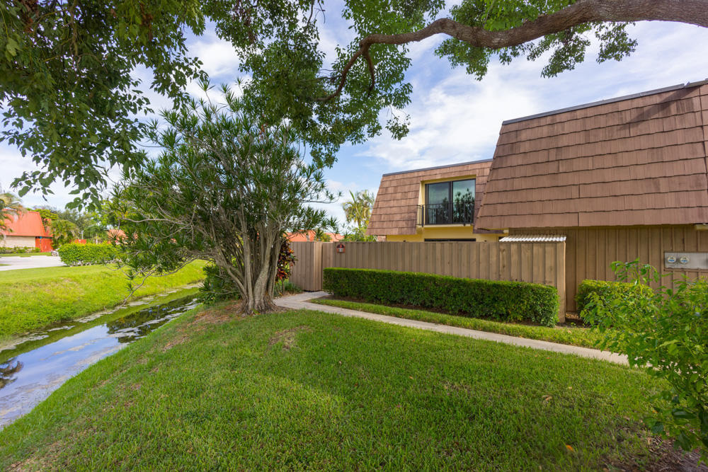 Welcome to this charming 2-bedroom, 2.5-bathroom townhouse nestled in the desirable Sandalwood Estates community of Palm Beach Gardens, Florida. This two-story residence offers 1,236 square feet of finished living space, thoughtfully designed to maximize comfort and functionality. As a waterfront property, this townhouse provides a unique opportunity to enjoy aquatic surroundings while residing in an established residential community. The versatile floor plan accommodates various lifestyle needs with its well-appointed bedrooms and bathrooms. This waterfront townhouse in Sandalwood Estates presents an excellent opportunity for those seeking a distinctive property in Palm Beach Gardens.
