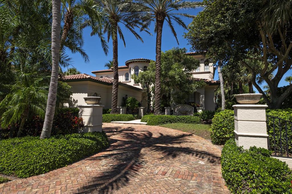 Bold architectural & refined design details give this harbor front estate European flair. Formal living & dining rooms include cove ceilings, Venetian plaster treatment, gas fireplace, arched niches & windows, French doors opening to harbor views. Chefs will value the eat-in kitchen with Dacor 6-burner gas stove with double oven & warming drawer, Sub-Zero refrigerator, 2 KitchenAid dishwashers, center-island with vegetable sink & granite counters. The European style master bath wrapped in marble includes spa tub, separate step-down shower, his/hers vanities & water closets. 3 ensuite guest bedrooms complete the accommodations. Outdoor features include Summer kitchen, cabana bath, double slip dock to accommodate large vessel & smaller craft.