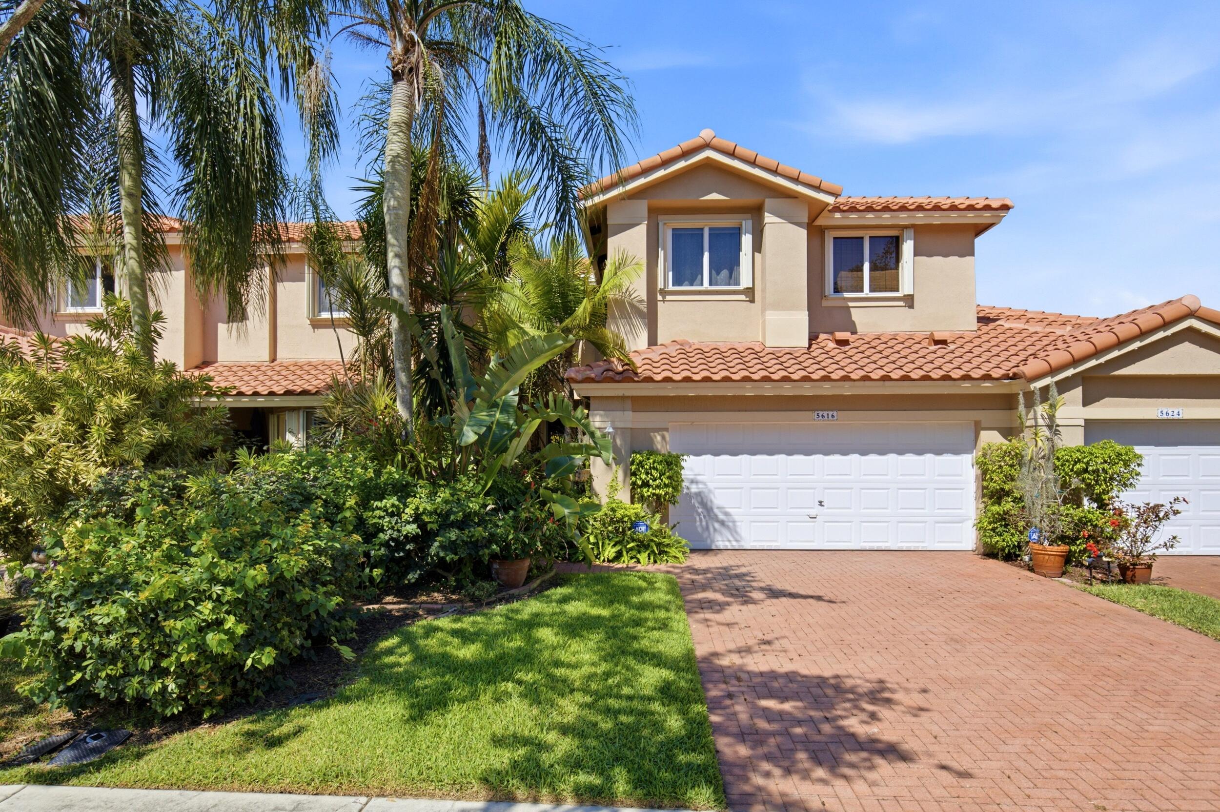 Welcome to this beautifully maintained 3 bedroom, 2.5 bath townhouse in the highly desirable Fairways of Heron Bay. This light filled home features soaring ceilings, an open and spacious floor plan, neutral finishes, tile flooring on the main level, and elegant wood stairs. The generous primary suite offers a private retreat, while two additional bedrooms provide ample space for family, guests, or a home office. Enjoy a 2 car garage, paver driveway, and lush tropical landscaping. Residents of Heron Bay have access to resort-style amenities, including clubhouses, pools, fitness centers, tennis courts, playgrounds, and scenic walking paths, all within a gated community served by Parkland's top rated schools. Experience the best of South Florida living!