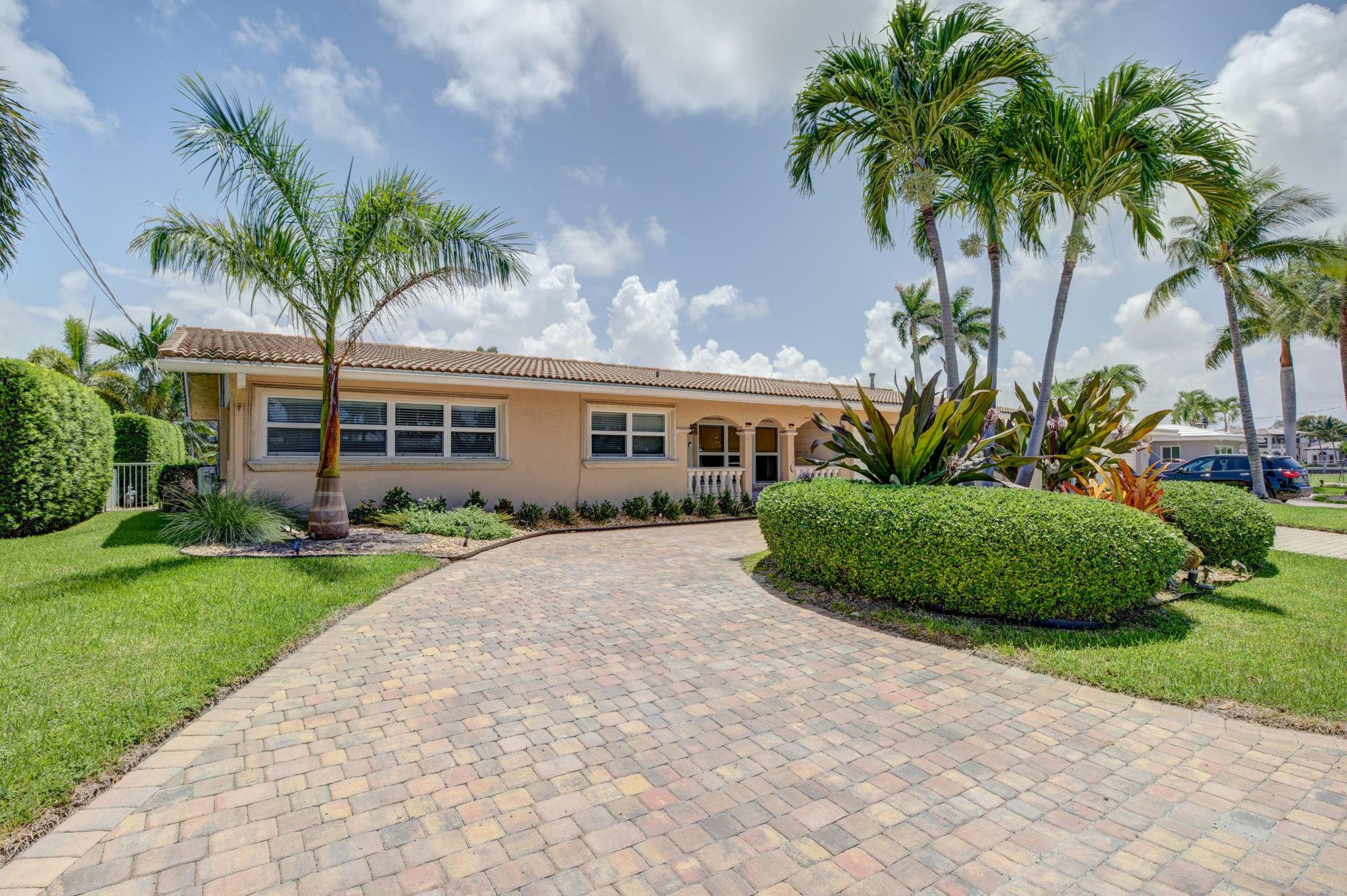 LIVE THE LIFESTYLE OF LAUDERDALE BY THE SEA! THIS PRIME WATERFRONT HOME IS SITUATED IN THE GATED COMMUNITY OF BEL-AIR ONLY 3 LOTS FROM THE INTRACOASTAL WATERWAY. THIS 3 BEDROOM/3 BATH IS TASTEFULLY UPDATED WITH COASTAL DESIGN INSPIRATION. LARGE OPEN KITCHEN W/ WHITE SHAKER CABINETRY, GRANITE COUNTERS, SS APPLIANCES & SKYLIGHT OFFERING ABUNDANT NATURAL LIGHT. FLORIDAROOM WITH A WALL OF WINDOWS OVERLOOKING THE SPARKLING POOL & CANAL. TROPICAL OASIS BACKYARD WITH WATER VIEWS, SALT WATER POOL, TRAVERTINE PAVERS & BUILT-IN OUTDOOR KITCHEN. COVERED LANAI WITH TV & SURROUND SOUND TO ENJOY THE BEACH LIFE. 85 FT ON THE WATER, NEW TREX DOCK & EASY OCEAN ACCESS VIA HILLSBORO INLET. CLOSE TO THE BEACH, RESTAURANTS, SHOPS & NIGHTLIFE!