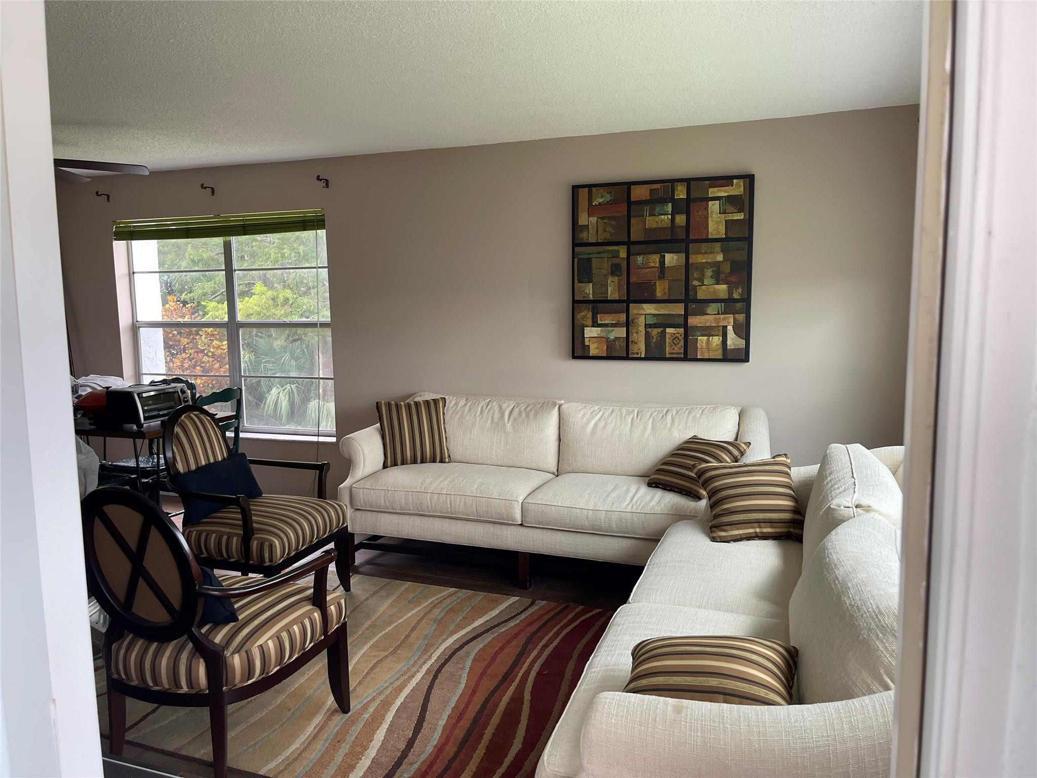 Nestled in a serene 55+ community, this beautifully maintained second-floor condo offers a peaceful retreat with spectacular golf course views. Enjoy the comfort of 1 bedroom, 1.5 bathrooms, and a spacious oversized walk-in closet. The unit is spotless and features tile flooring throughout The eat-in kitchen boasts ample cabinetry and provides a perfect space. The in-unit washer and dryer add to the convenience of daily living. The bedroom has an en-suite bath, offering privacy and comfort. Assigned parking space. Community amenities include a clubhouse, pool, and cable TV service. Animal Support Allowed