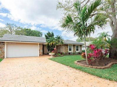 This tropical pool home features 3 bedrooms, 2 bathrooms, and a 2-car garage, along with impact windows for added security and insurance savings, 30+ year flat tile roof. Located in a highly sought-after area, this well-maintained single-family home.  You can make this dream tropical oasis in the heart of the Pine Ridge community of Coral Springs, your new home awaits.