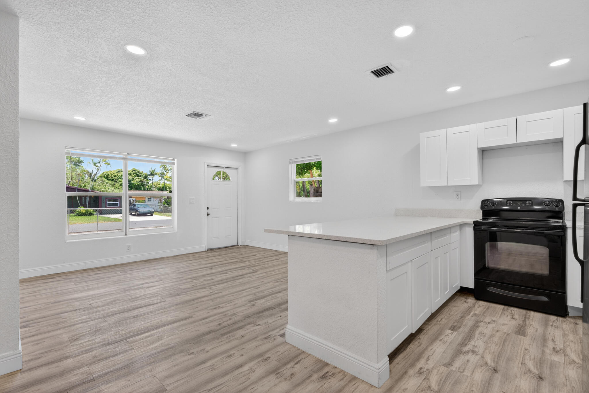 Welcome home! Recently redone 3 bed/2 bath home with versatile bonus room. This home has been renovated top to bottom. New roof, appliances, flooring, paint, and A/C unit. Home is conveniently located just minutes from the Pompano pier, shops, schools, and restaurants. Yard is fully fenced with room for a pool. Did I mention no HOA as well as affordable property taxes. So much opportunity here!