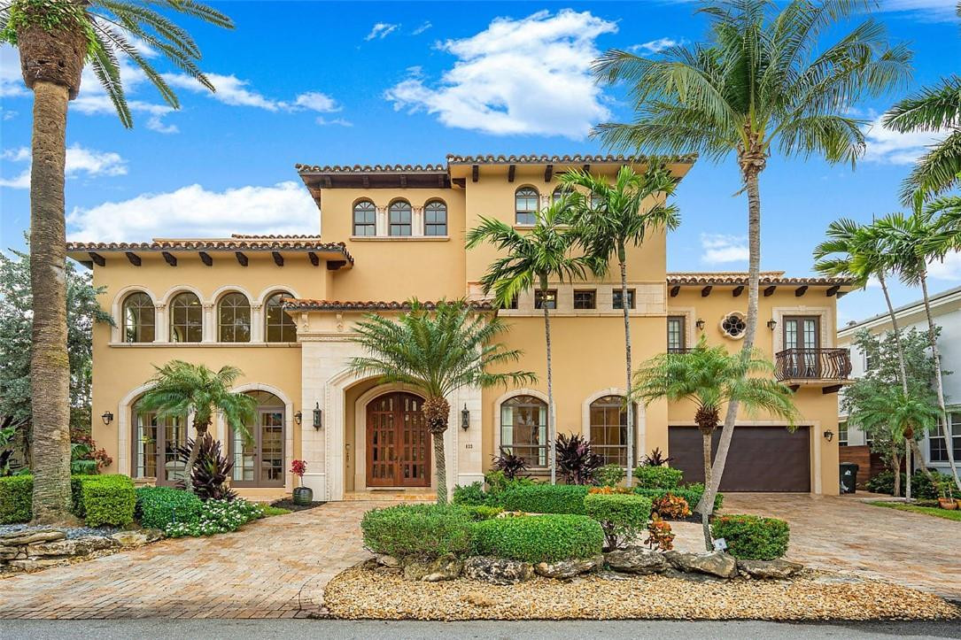 Prestigious 3 story home in the gated community of Riviera Isles. Located a few blocks from Fort Lauderdale Beach. 83ft of deep water frontage, 8 min from direct ocean access. NO fixed bridges. Foyer entrance opens up to 30 ft ceilings, grand staircase, and an elevator that offers a private entry to master suite. Spacious, elegant first floor living areas feature a double sided fireplace, formal dining, and open kitchen with upscale amenities at every turn. Master suite offers walk in closets, oversized master bath, and a master balcony that spans in length overlooking the pool and gorgeous waterway. Whole house generator, 3 car garage, heated pool, and private dockage for a 70ft boat. Third floor entertainment room, wet bar, and access to two roof top terraces, boasting spectacular views.